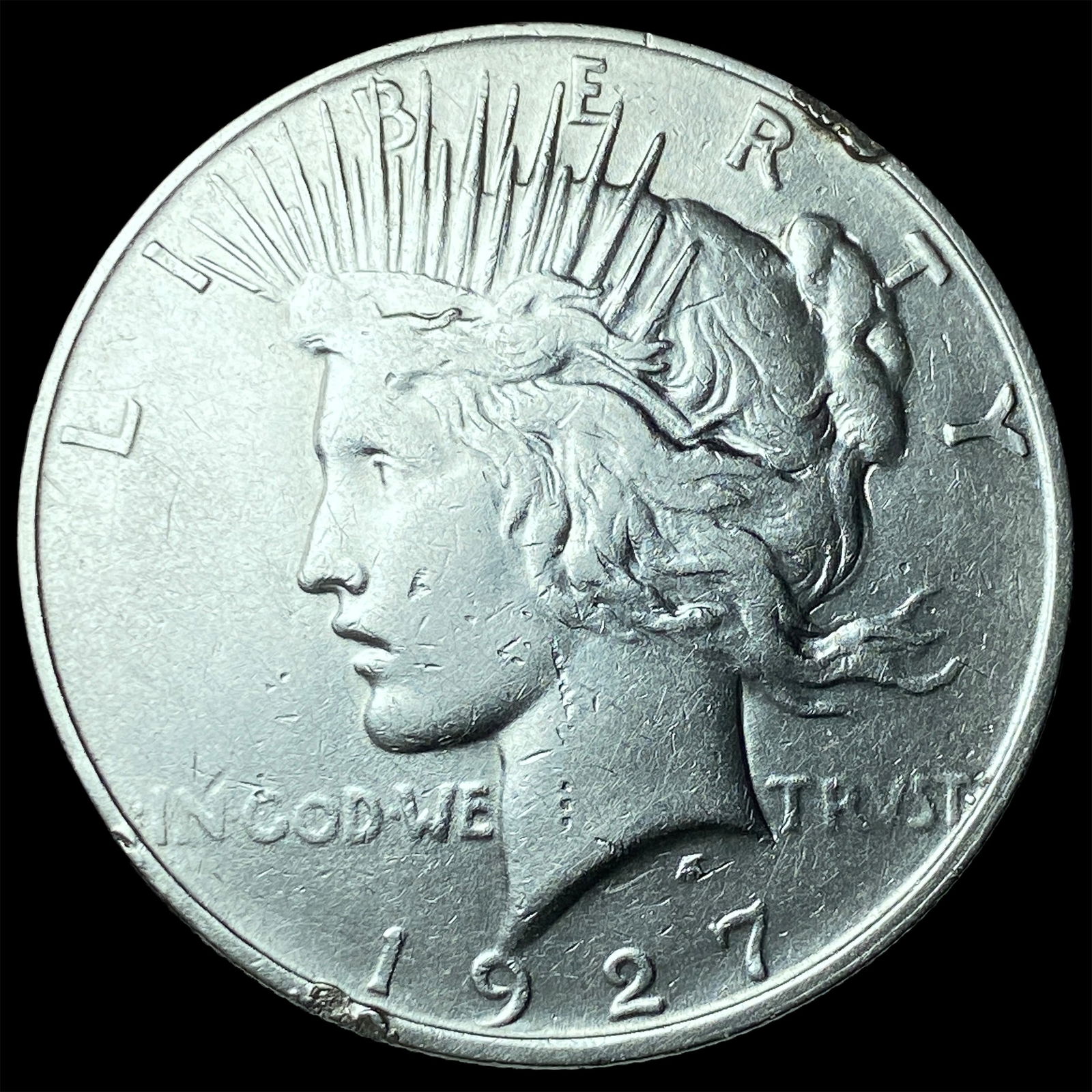 1927 Peace Silver Dollar NEARLY UNCIRCULATED (1 of 2)