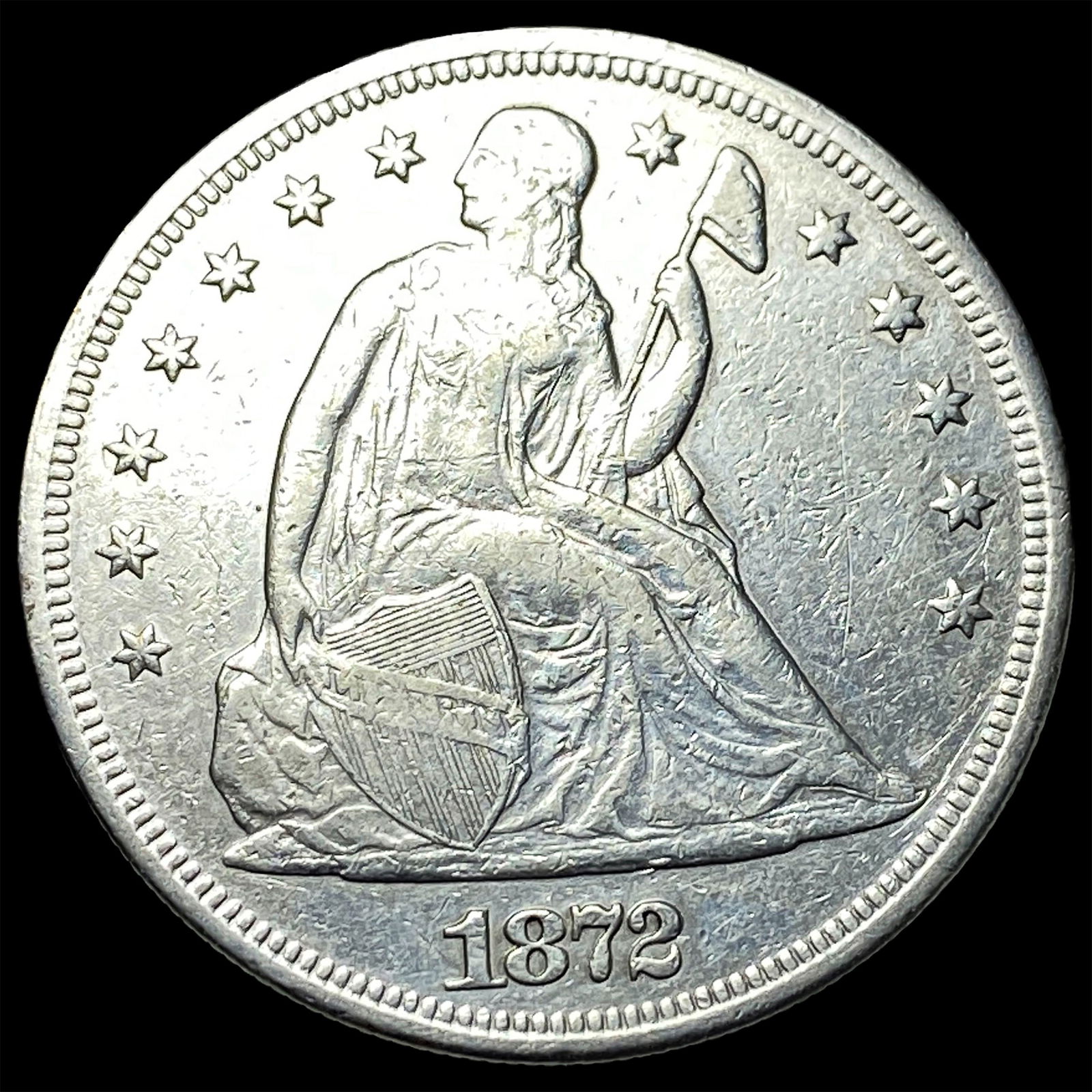 1872 Silver Seated Liberty Dollar NEARLY UNCIRCULATED: 1872 Silver Seated Liberty Dollar NEARLY UNCIRCULATED