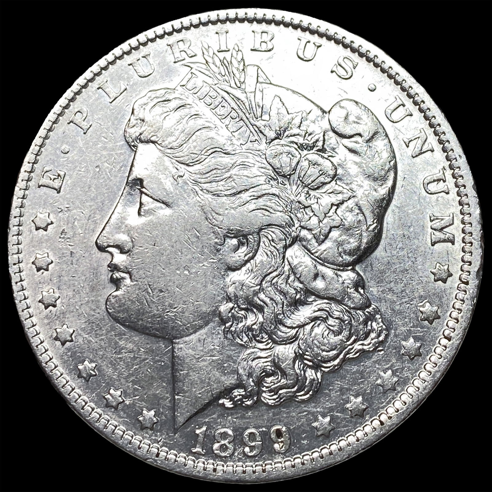 1899-O Silver Morgan Dollar NEARLY UNCIRCULATED: 1899-O Silver Morgan Dollar NEARLY UNCIRCULATED