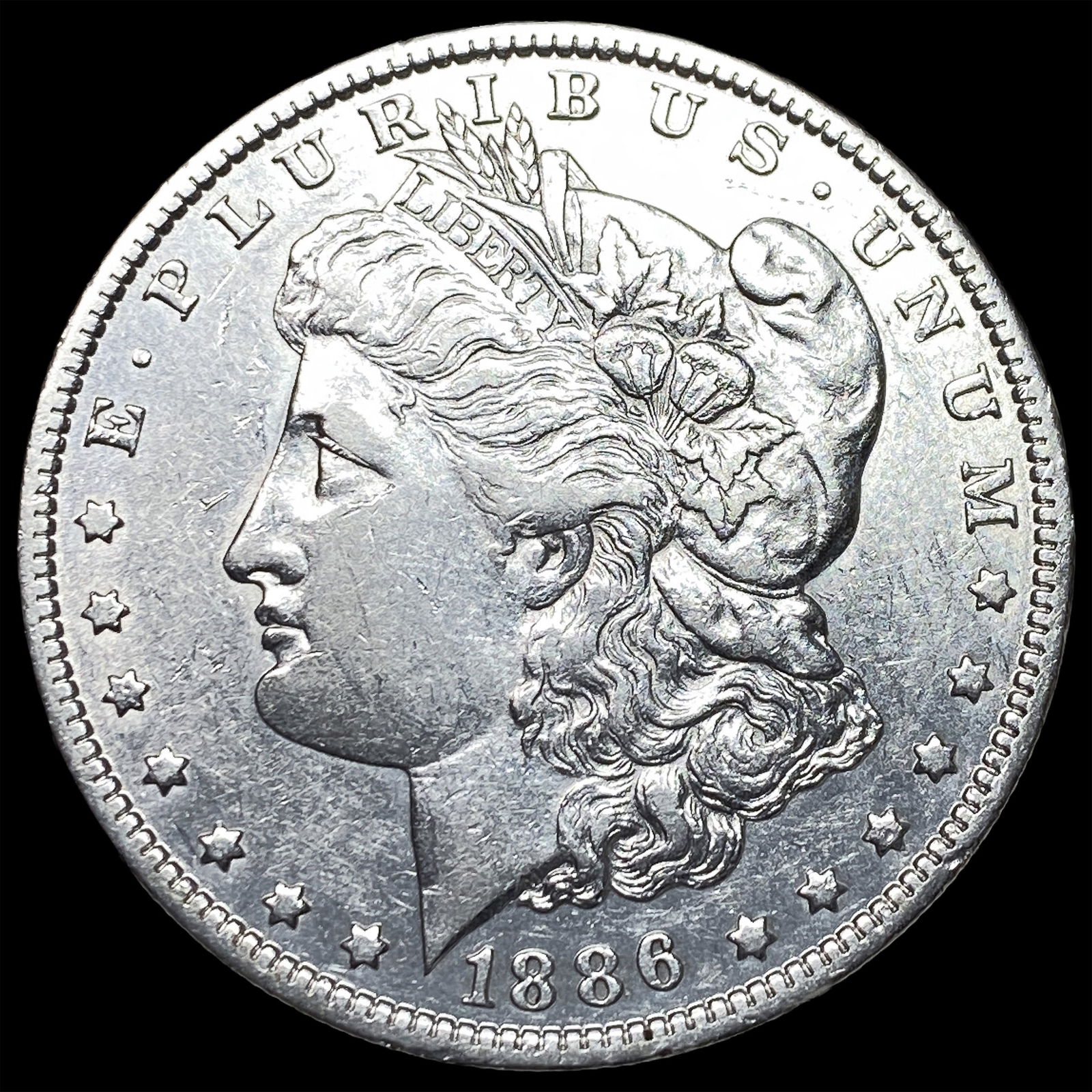 1886-O Silver Morgan Dollar NEARLY UNCIRCULATED: 1886-O Silver Morgan Dollar NEARLY UNCIRCULATED