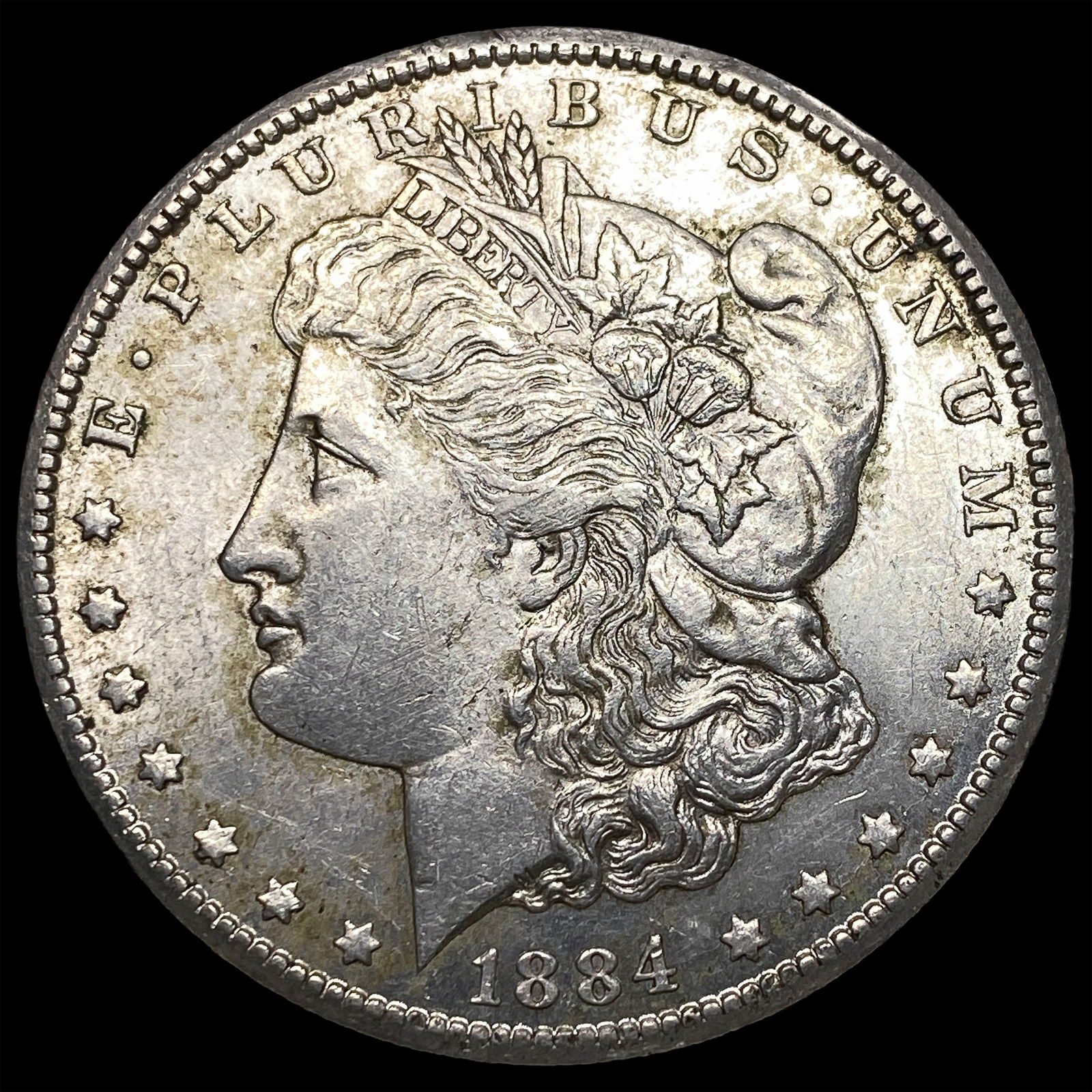 1884-CC Silver Morgan Dollar CLOSELY UNCIRCULATED (1 of 2)