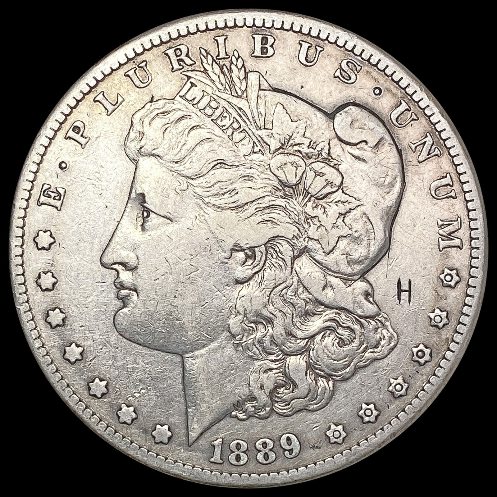 1889-CC Morgan Silver Dollar NEARLY UNCIRCULATED (1 of 2)