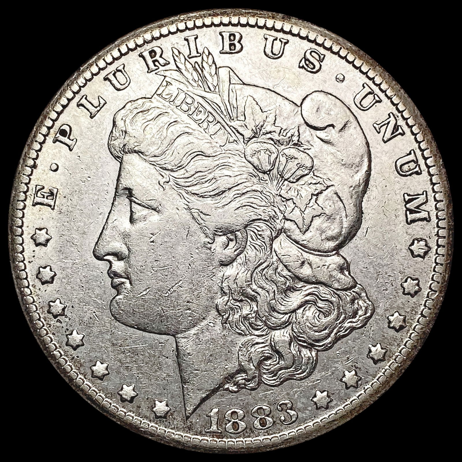 1883-CC Morgan Silver Dollar CLOSELY UNCIRCULATED (1 of 2)