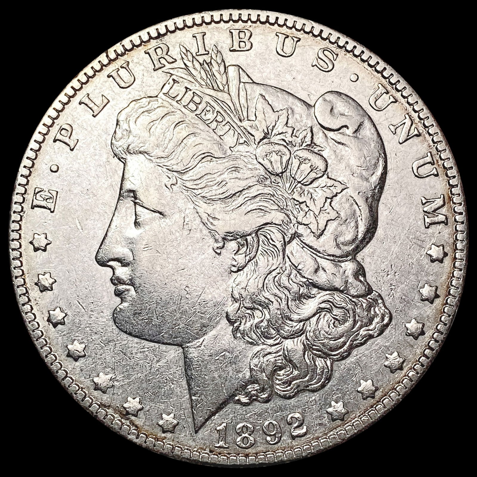 1892-O Morgan Silver Dollar CLOSELY UNCIRCULATED (1 of 2)