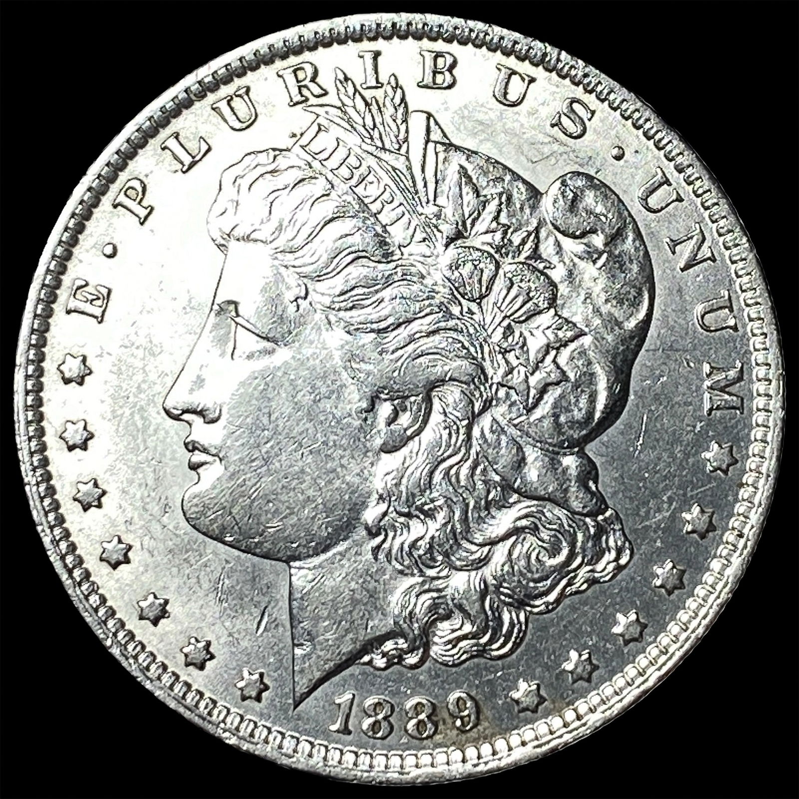 1889 Morgan Silver Dollar CLOSELY UNCIRCULATED (1 of 2)