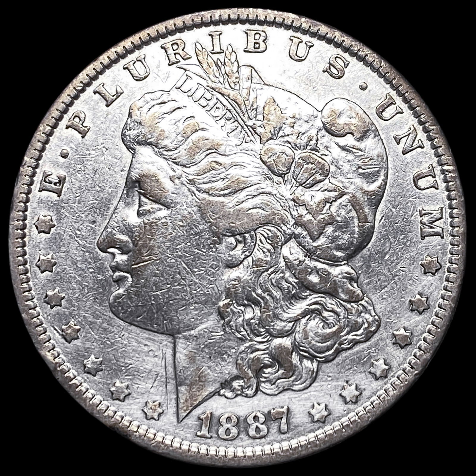 1887 Silver Morgan Dollar CLOSELY UNCIRCULATED: 1887 Silver Morgan Dollar CLOSELY UNCIRCULATED