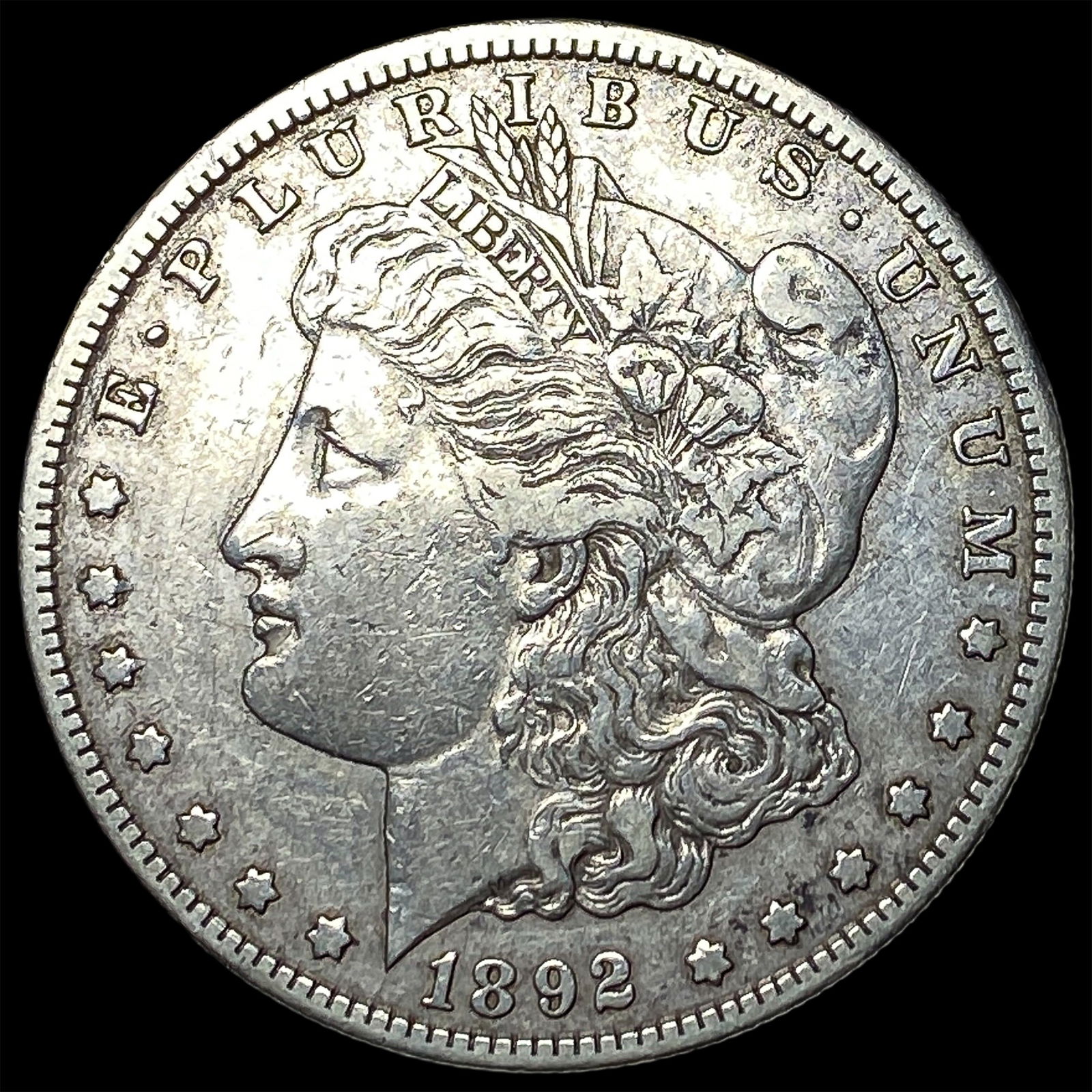 1892-S Silver Morgan Dollar NEARLY UNCIRCULATED (1 of 2)