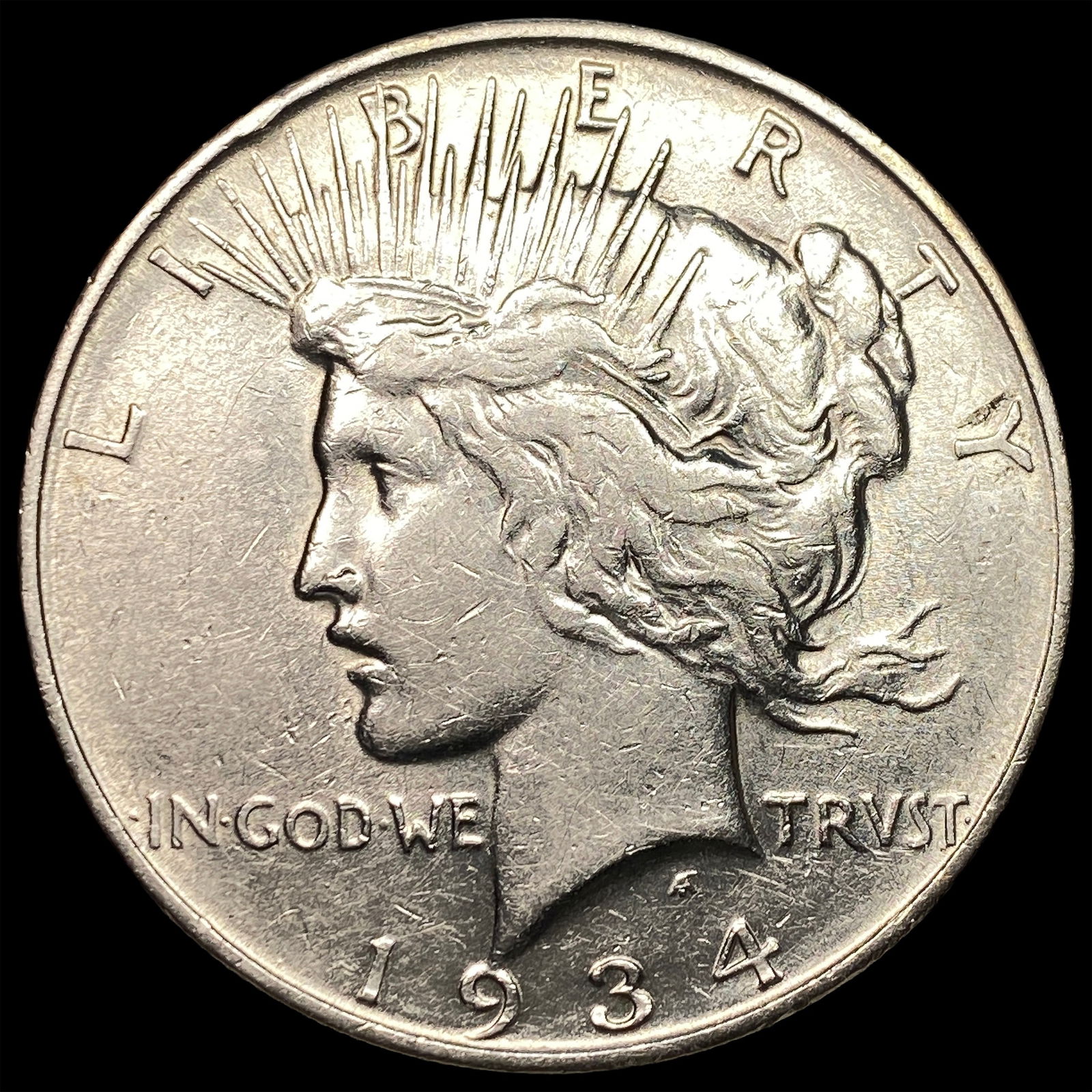 1934 Silver Peace Dollar CLOSELY UNCIRCULATED (1 of 2)