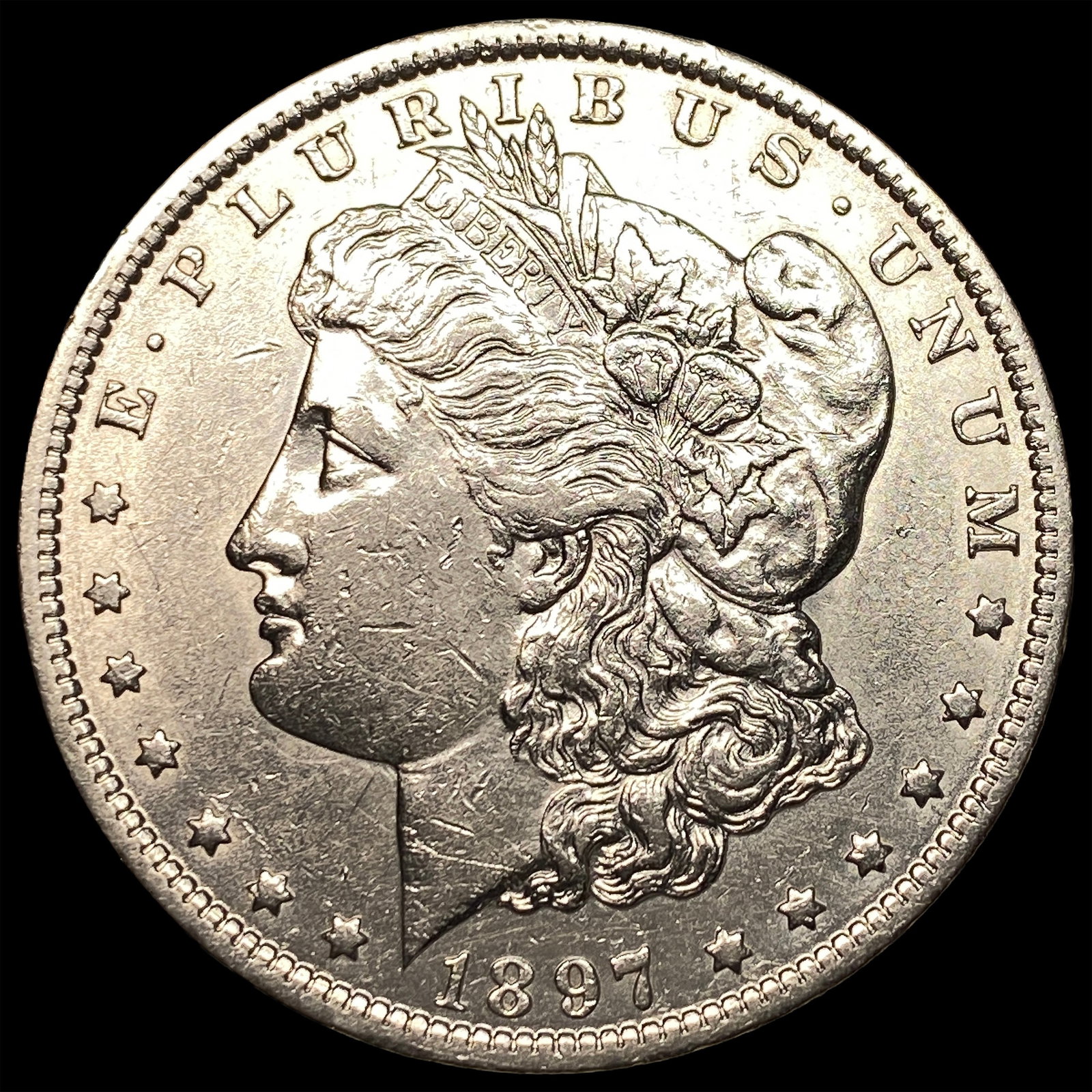 1897-O Silver Morgan Dollar CLOSELY UNCIRCULATED: 1897-O Silver Morgan Dollar CLOSELY UNCIRCULATED
