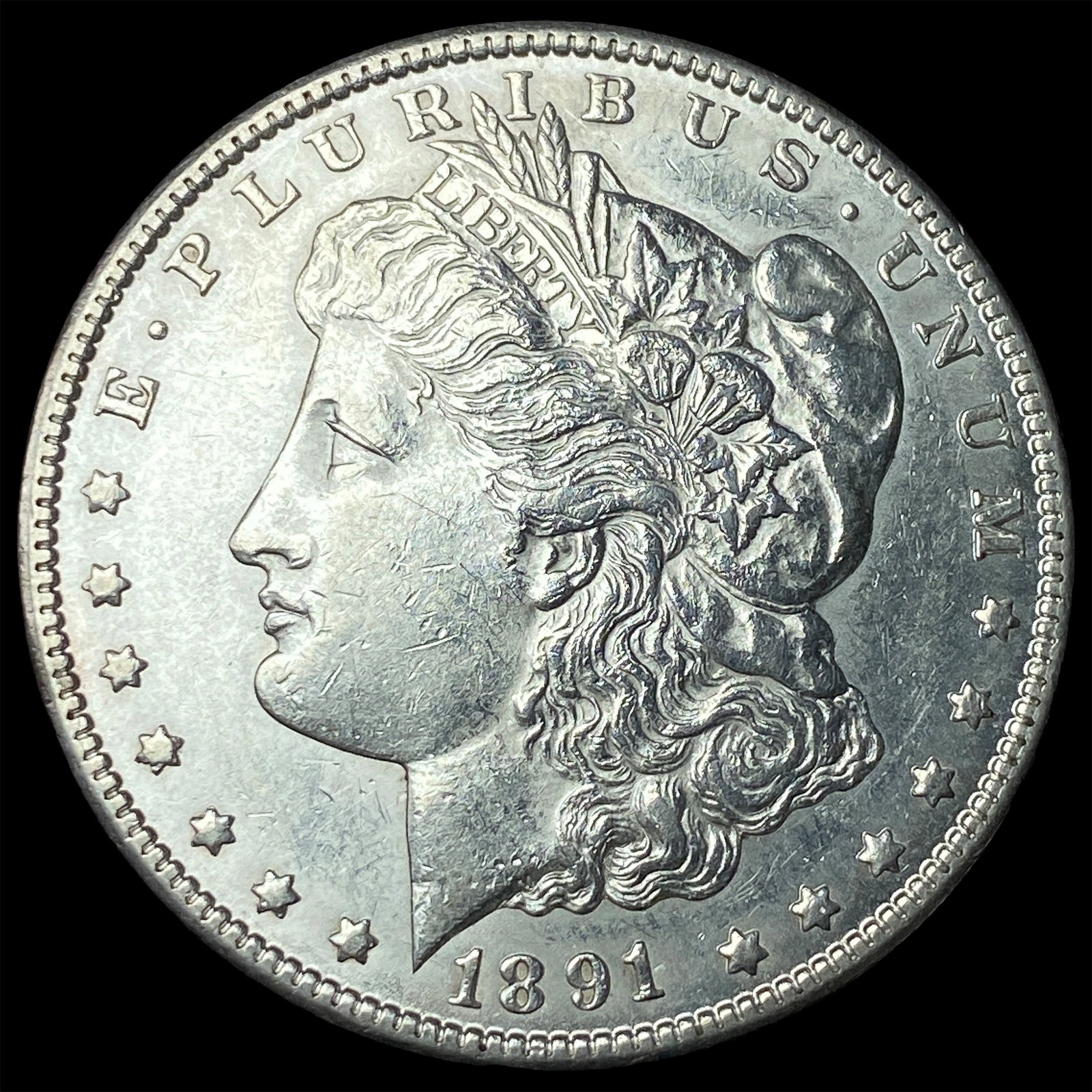 1891-CC Silver Morgan Dollar CLOSELY UNCIRCULATED: 1891-CC Silver Morgan Dollar CLOSELY UNCIRCULATED