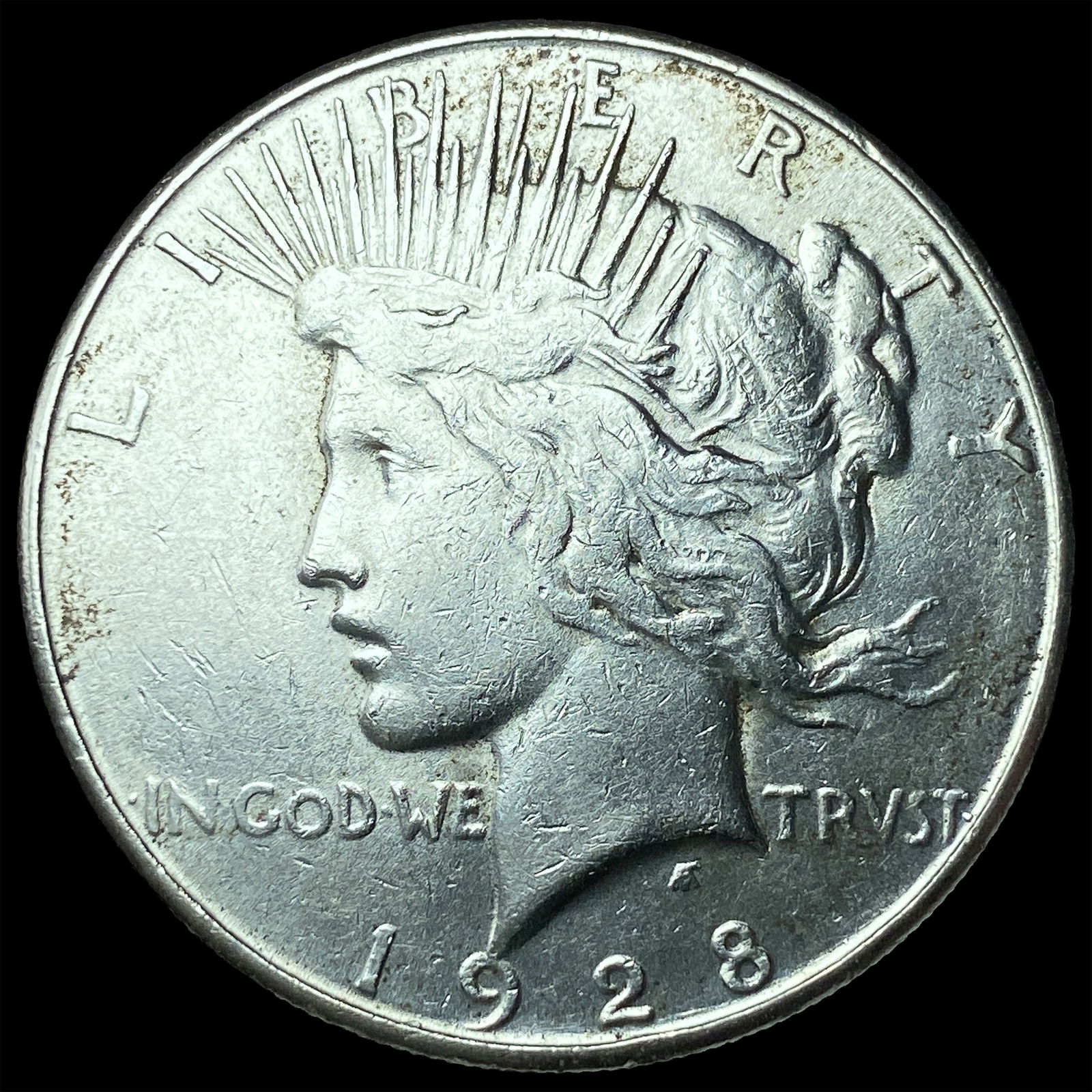 1928-S Silver Peace Dollar CLOSELY UNCIRCULATED (1 of 2)