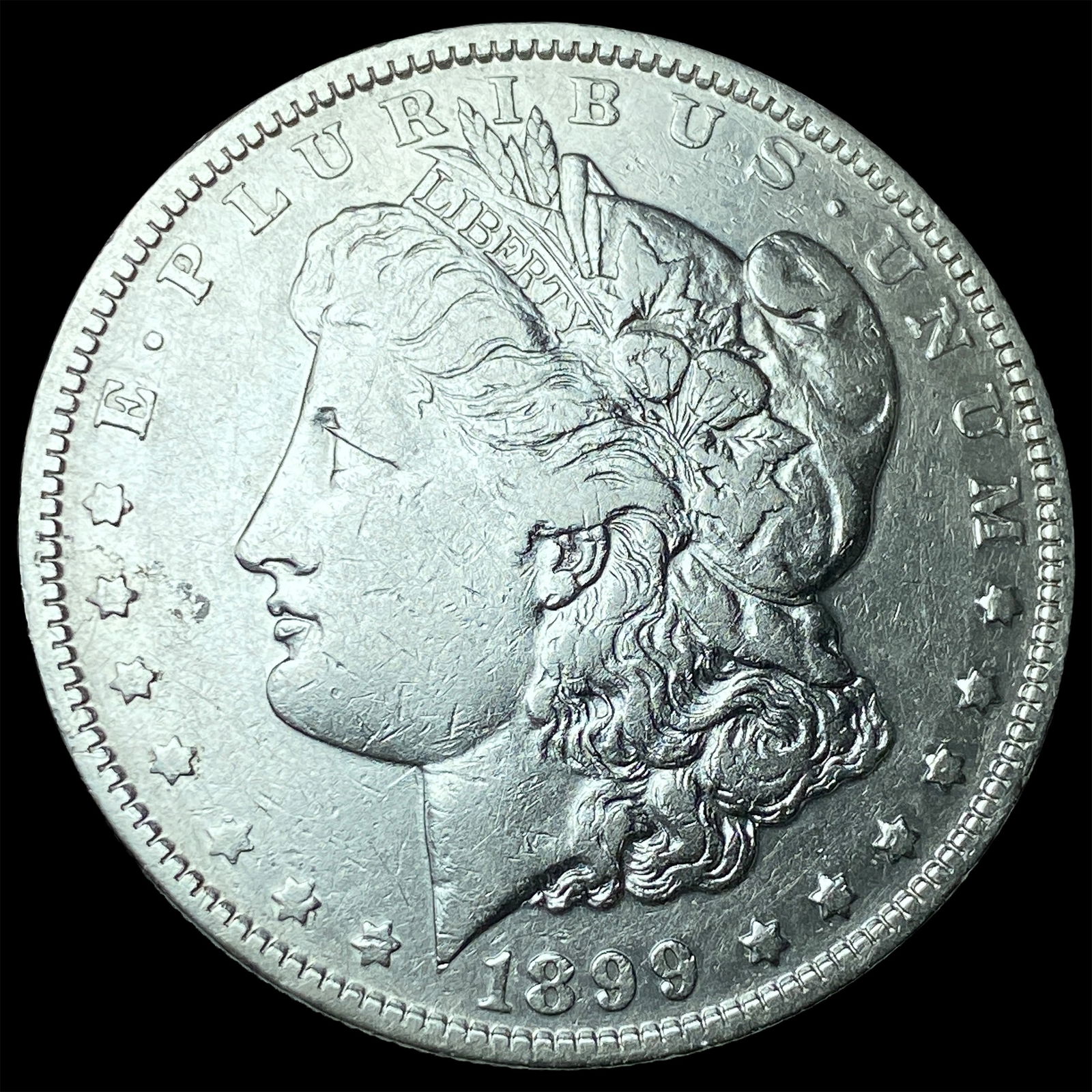 1899-O Micro O Morgan Silver Dollar NEARLY UNCIRCULATED: 1899-O Micro O Morgan Silver Dollar NEARLY UNCIRCULATED