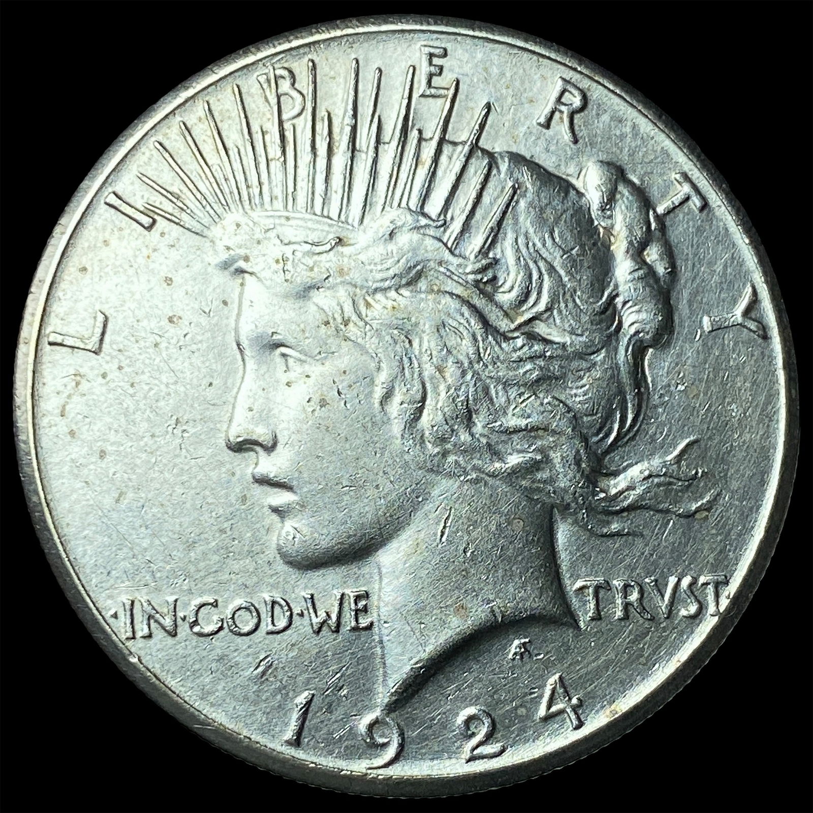 1924 Peace Silver Dollar CLOSELY UNCIRCULATED (1 of 2)