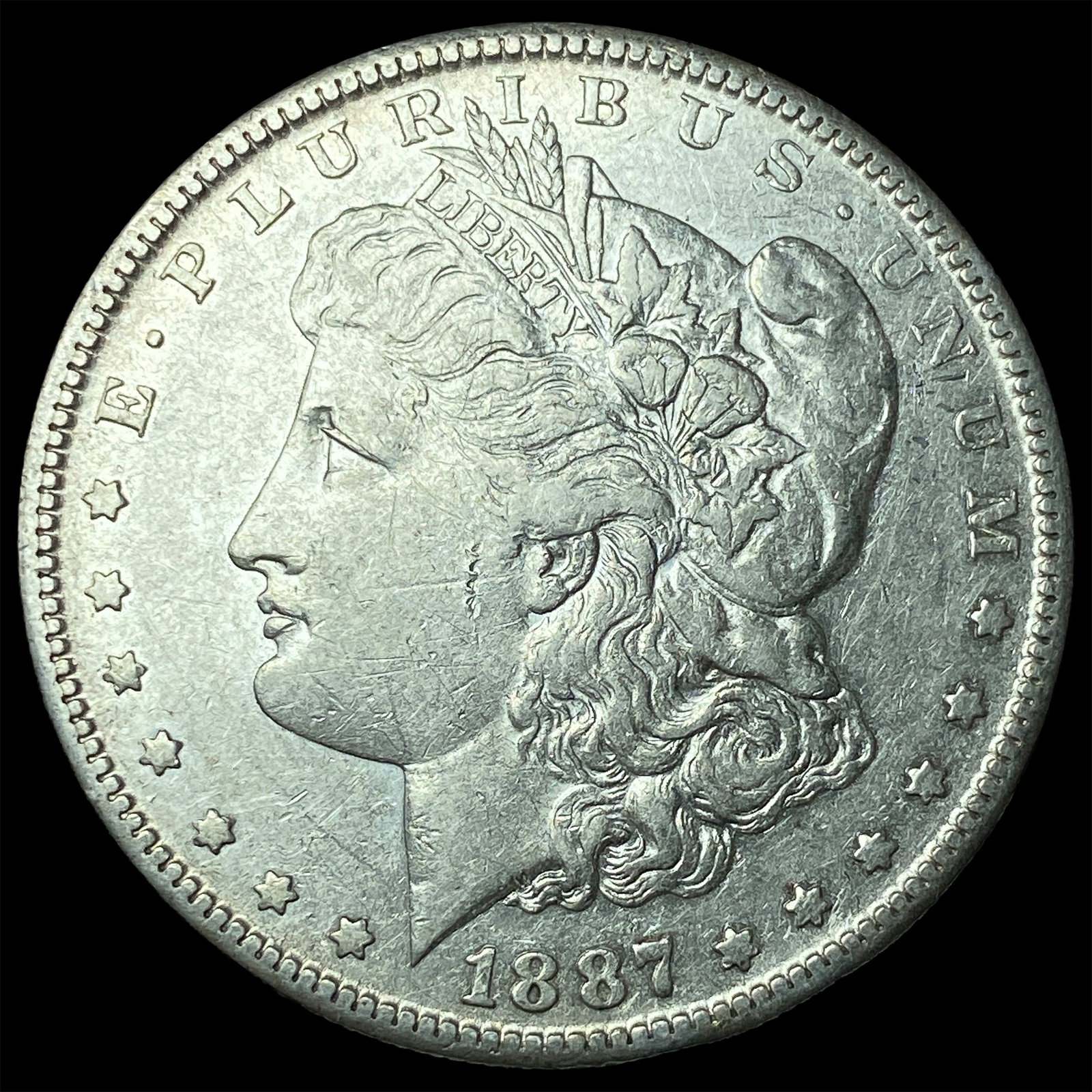 1887-S Silver Morgan Dollar NEARLY UNCIRCULATED (1 of 2)