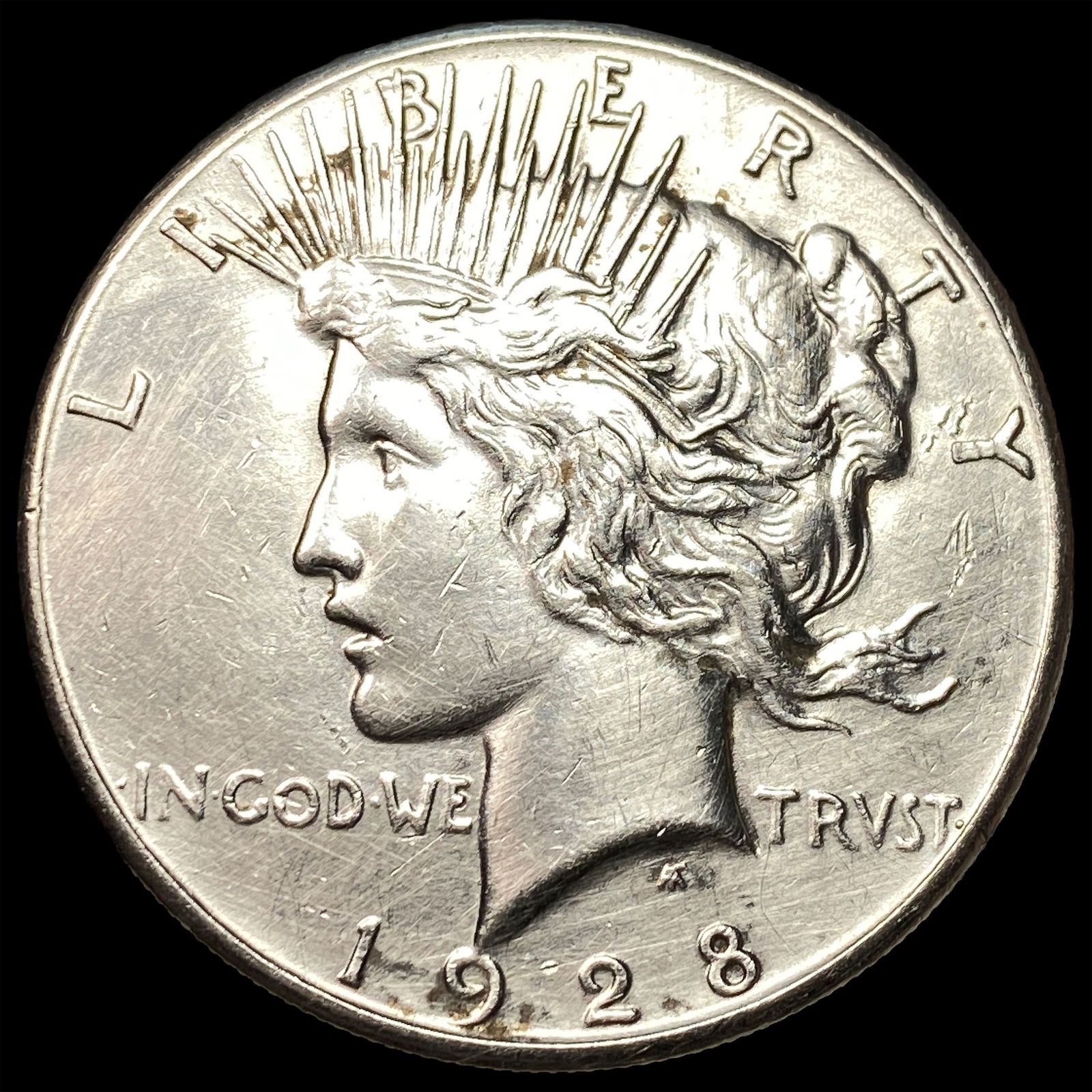 1928 Silver Peace Dollar CLOSELY UNCIRCULATED (1 of 2)
