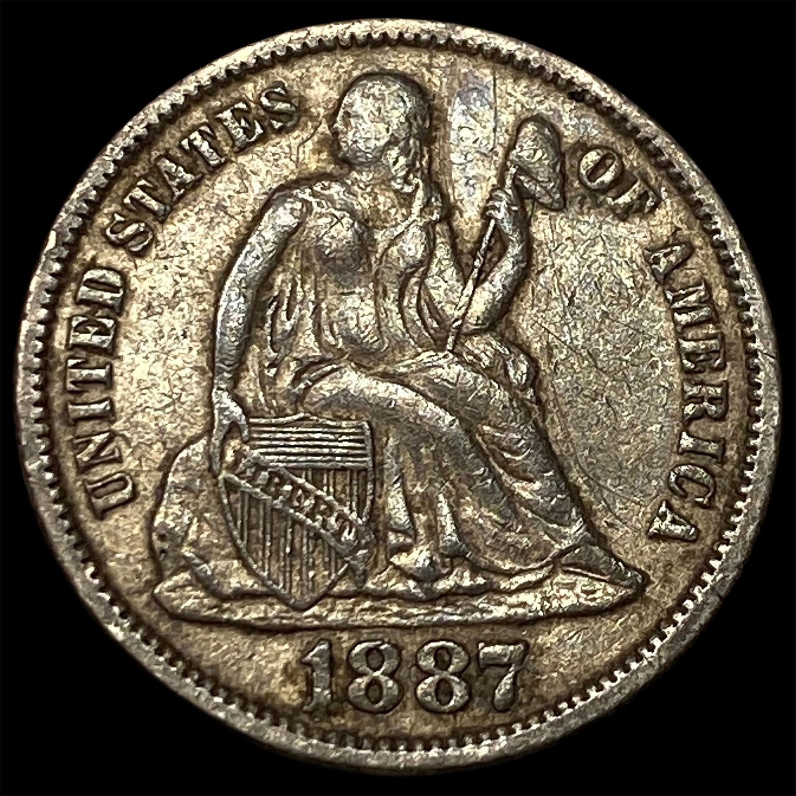 1887 Seated Liberty Dime NEARLY UNCIRCULATED (1 of 2)