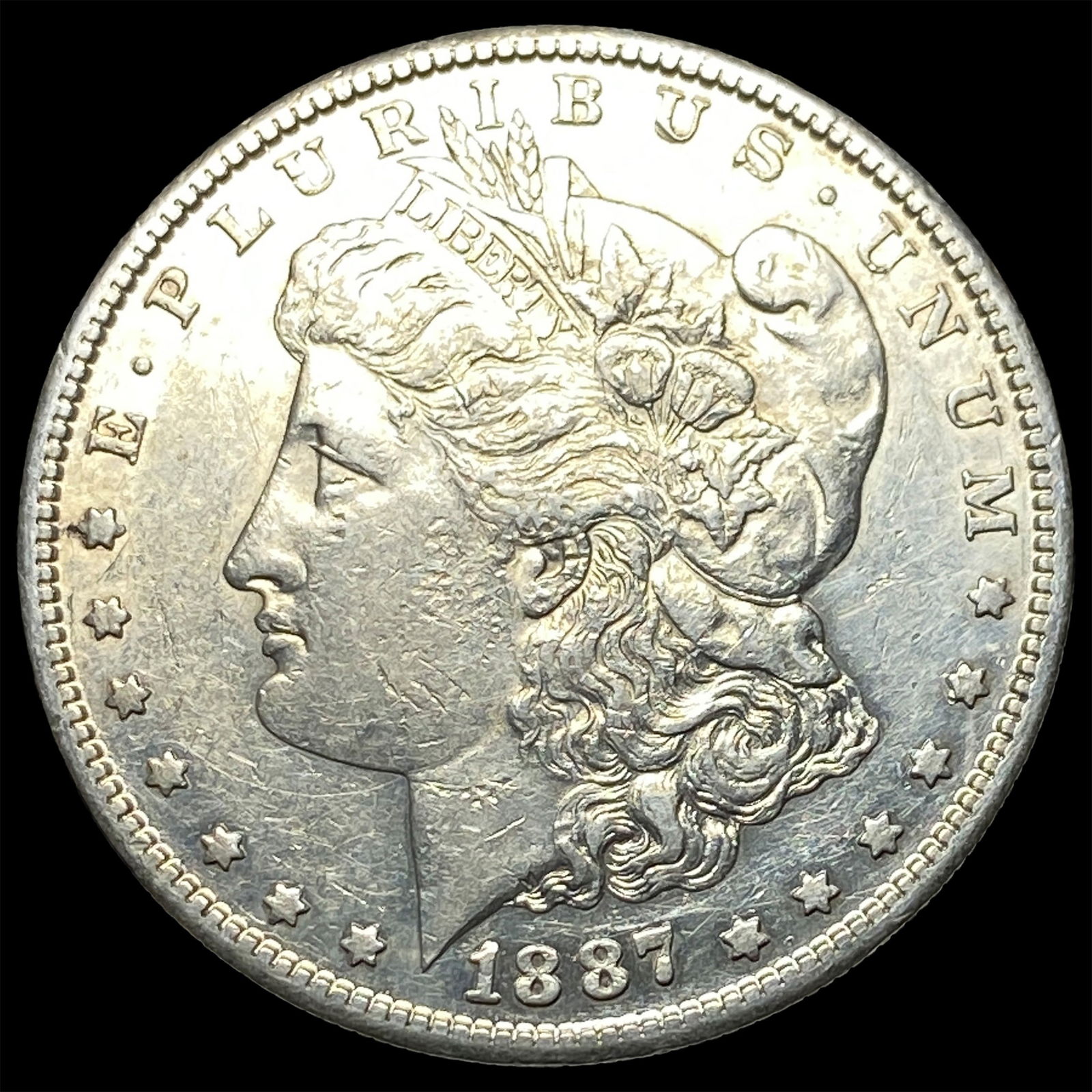 1887 Silver Morgan Dollar CLOSELY UNCIRCULATED: 1887 Silver Morgan Dollar CLOSELY UNCIRCULATED