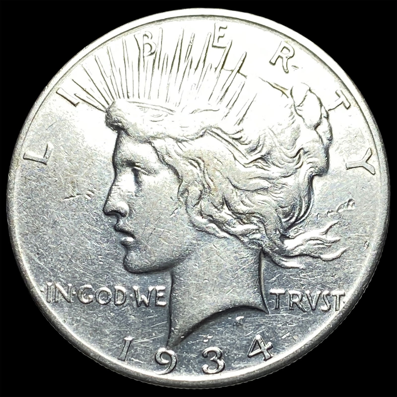 1934 Peace Silver Dollar NEARLY UNCIRCULATED (1 of 2)