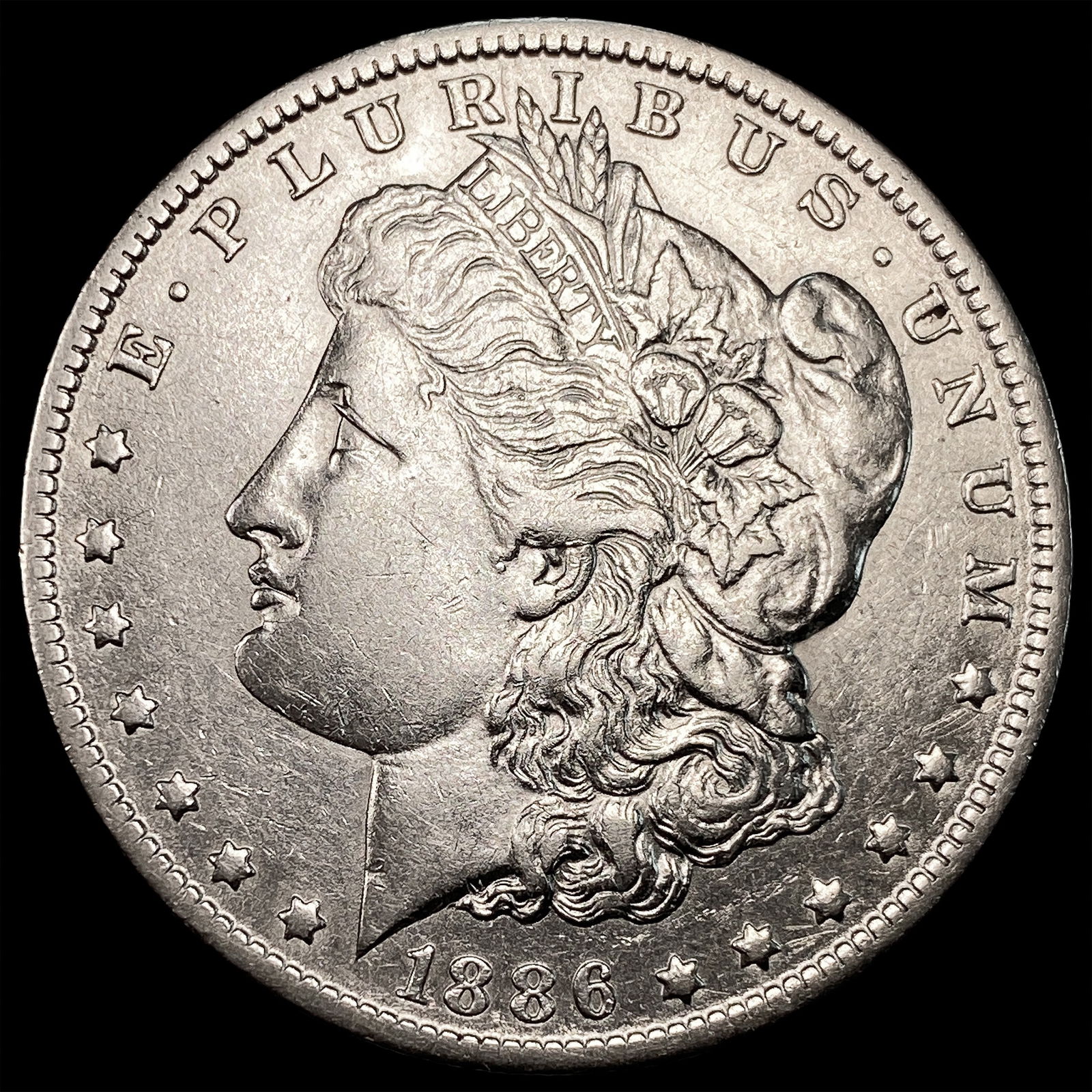 1886-O Silver Morgan Dollar CLOSELY UNCIRCULATED: 1886-O Silver Morgan Dollar CLOSELY UNCIRCULATED