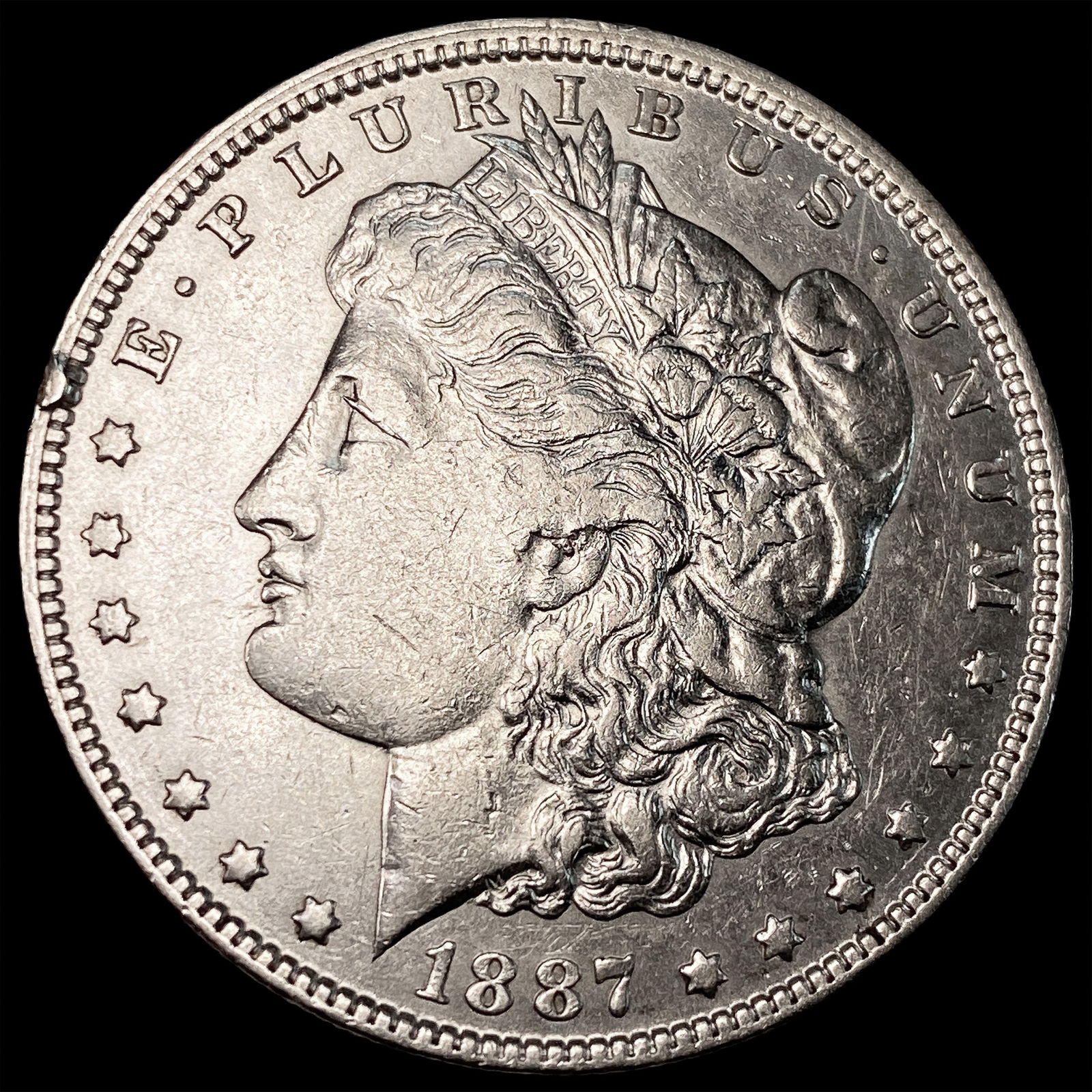 1887 Silver Morgan Dollar CLOSELY UNCIRCULATED (1 of 2)