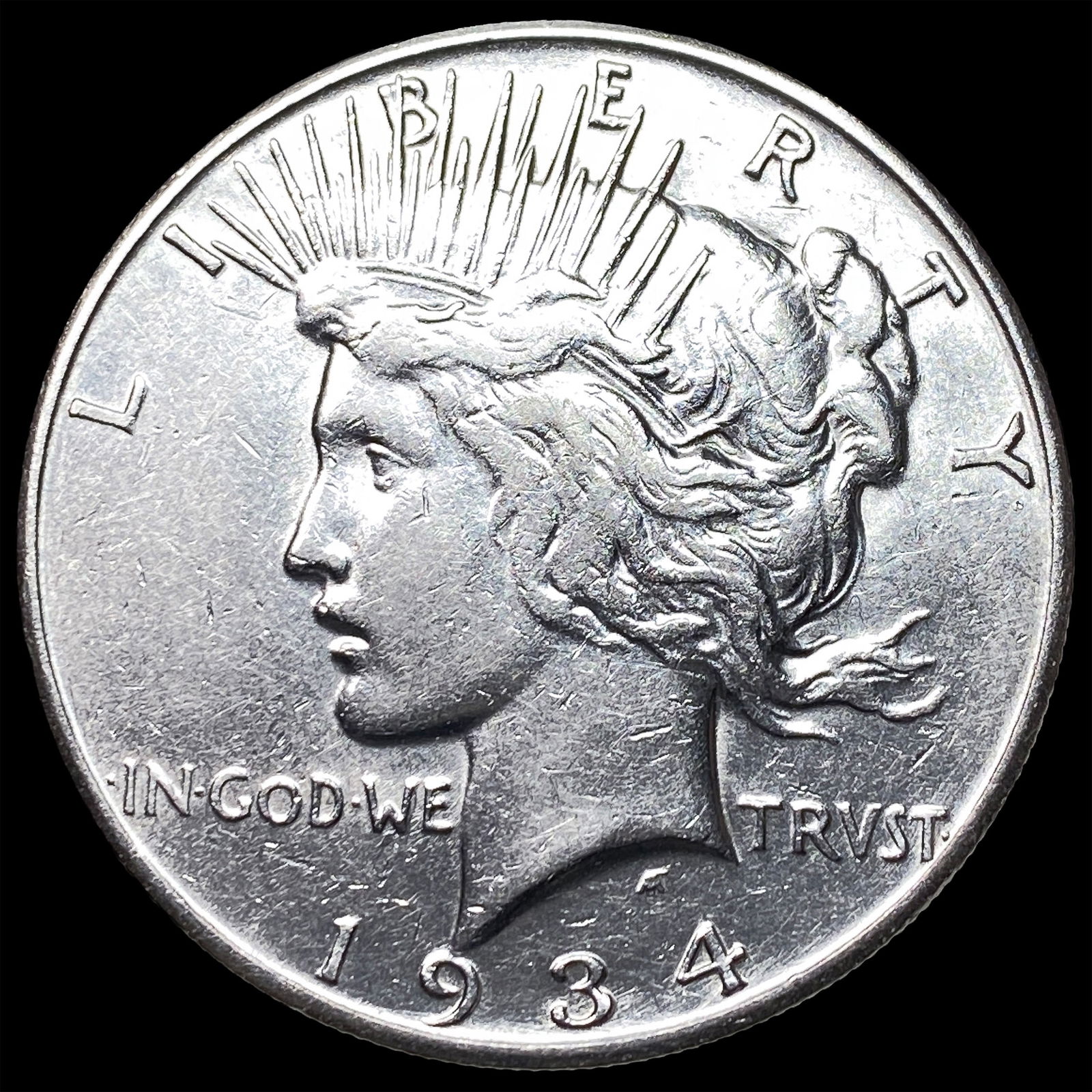1934 Peace Silver Dollar NEARLY UNCIRCULATED (1 of 2)