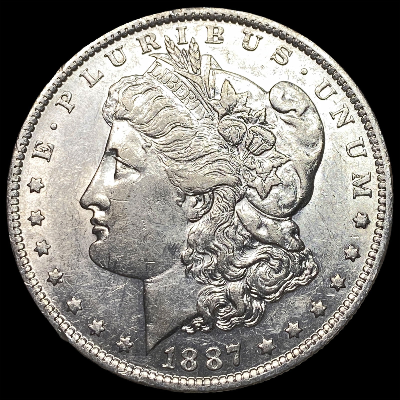 1887-O Silver Morgan Dollar CLOSELY UNCIRCULATED: 1887-O Silver Morgan Dollar CLOSELY UNCIRCULATED