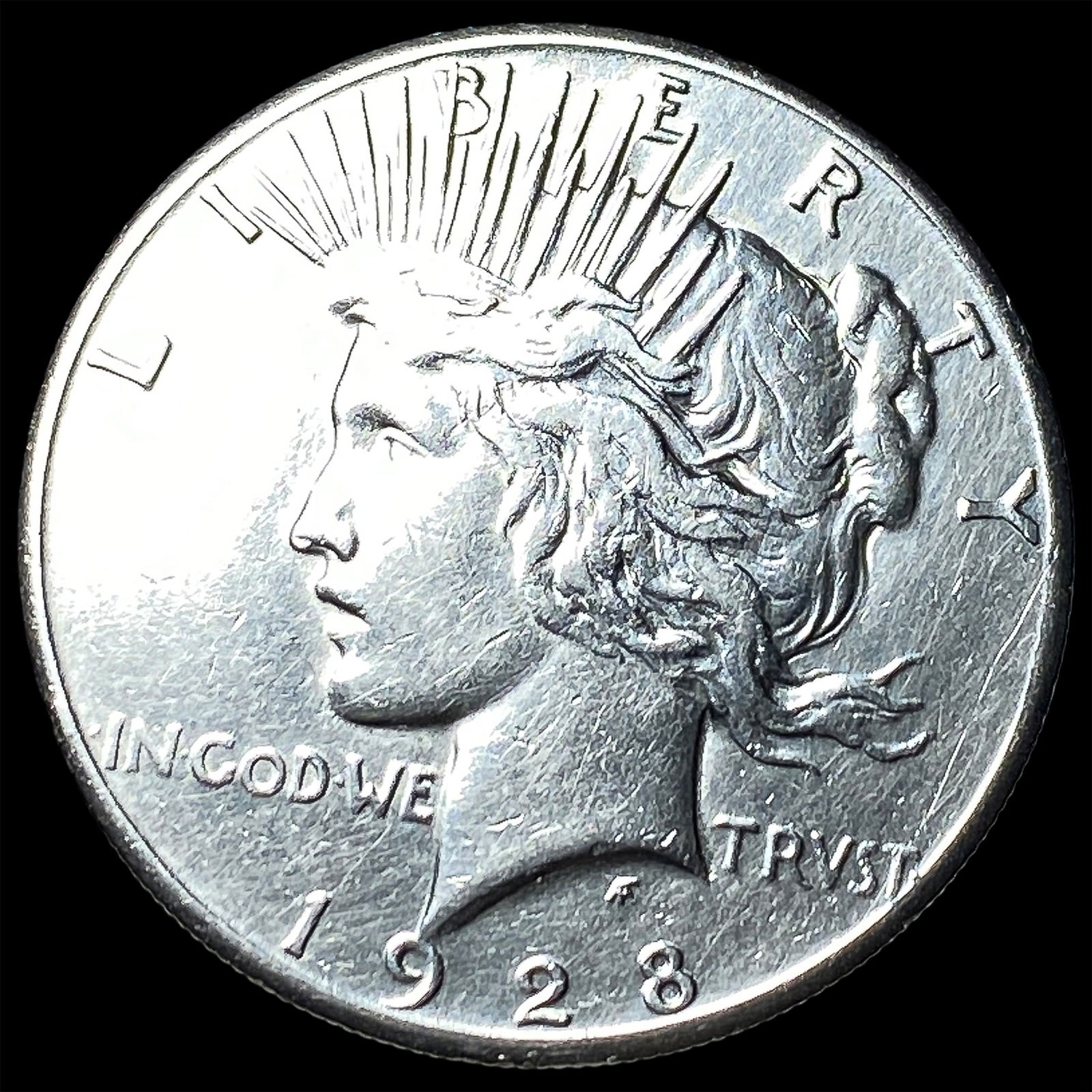1928 Silver Peace Dollar CLOSELY UNCIRCULATED (1 of 2)