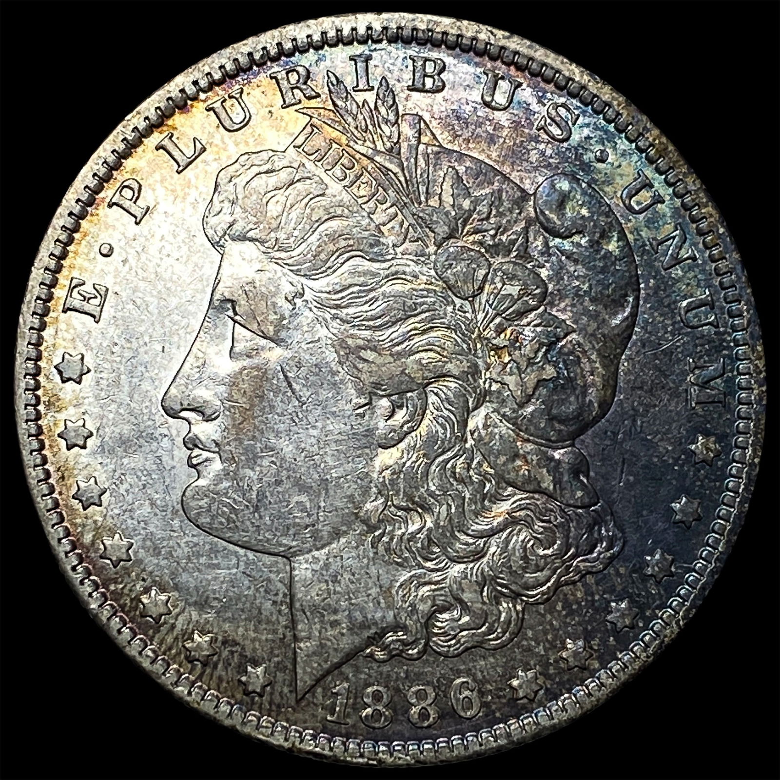 1886-O Silver Morgan Dollar CLOSELY UNCIRCULATED (1 of 2)
