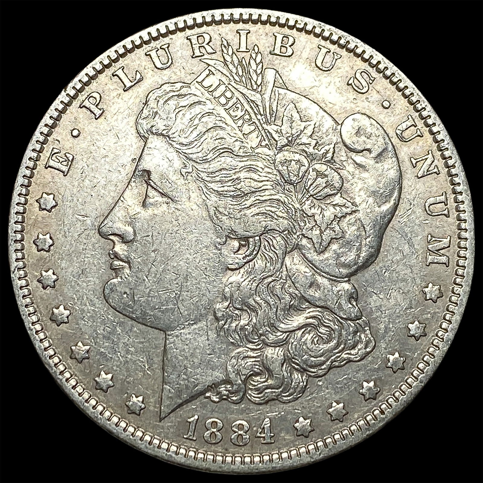 1884 Morgan Silver Dollar CLOSELY UNCIRCULATED (1 of 2)