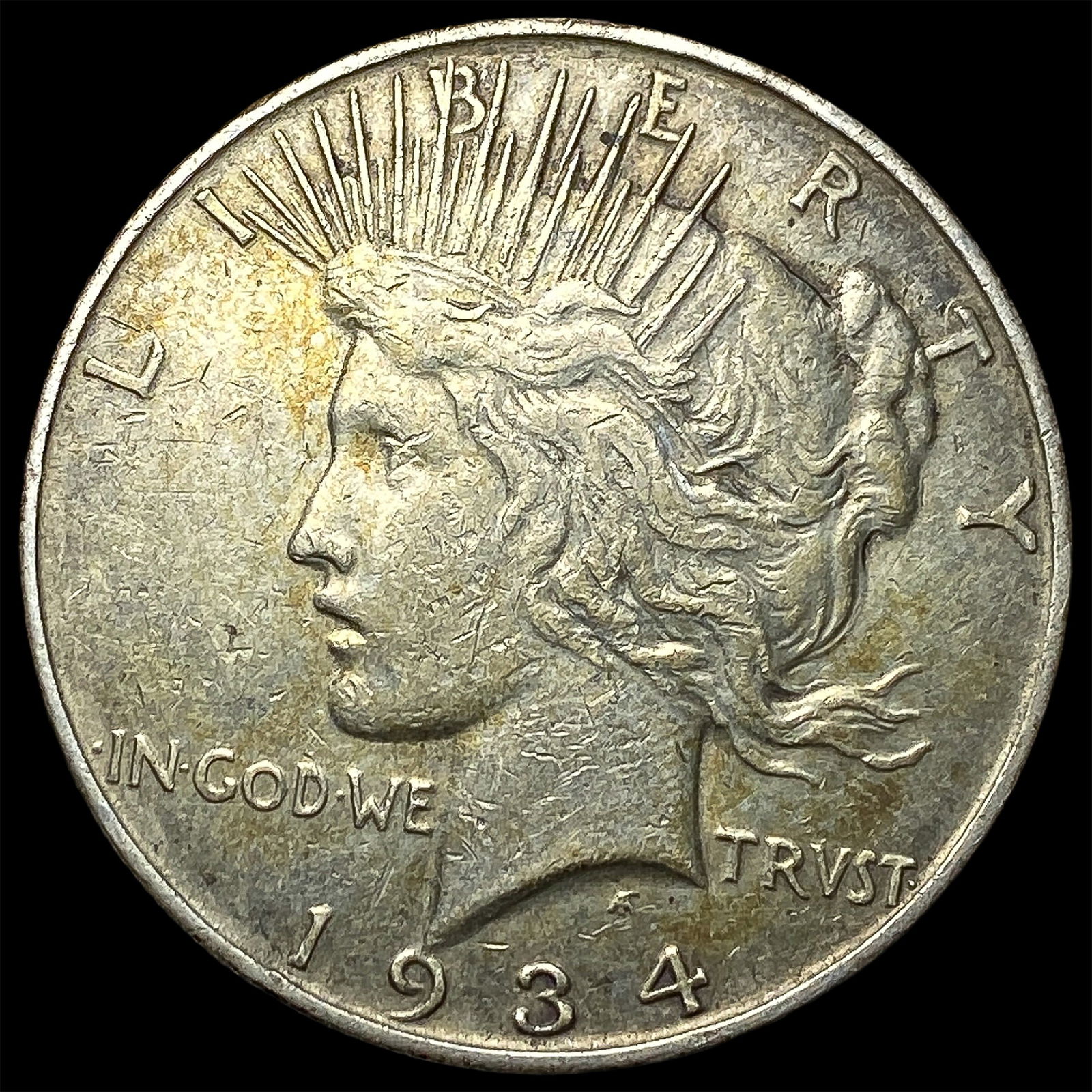 1934 Peace Silver Dollar ABOUT UNCIRCULATED (1 of 2)