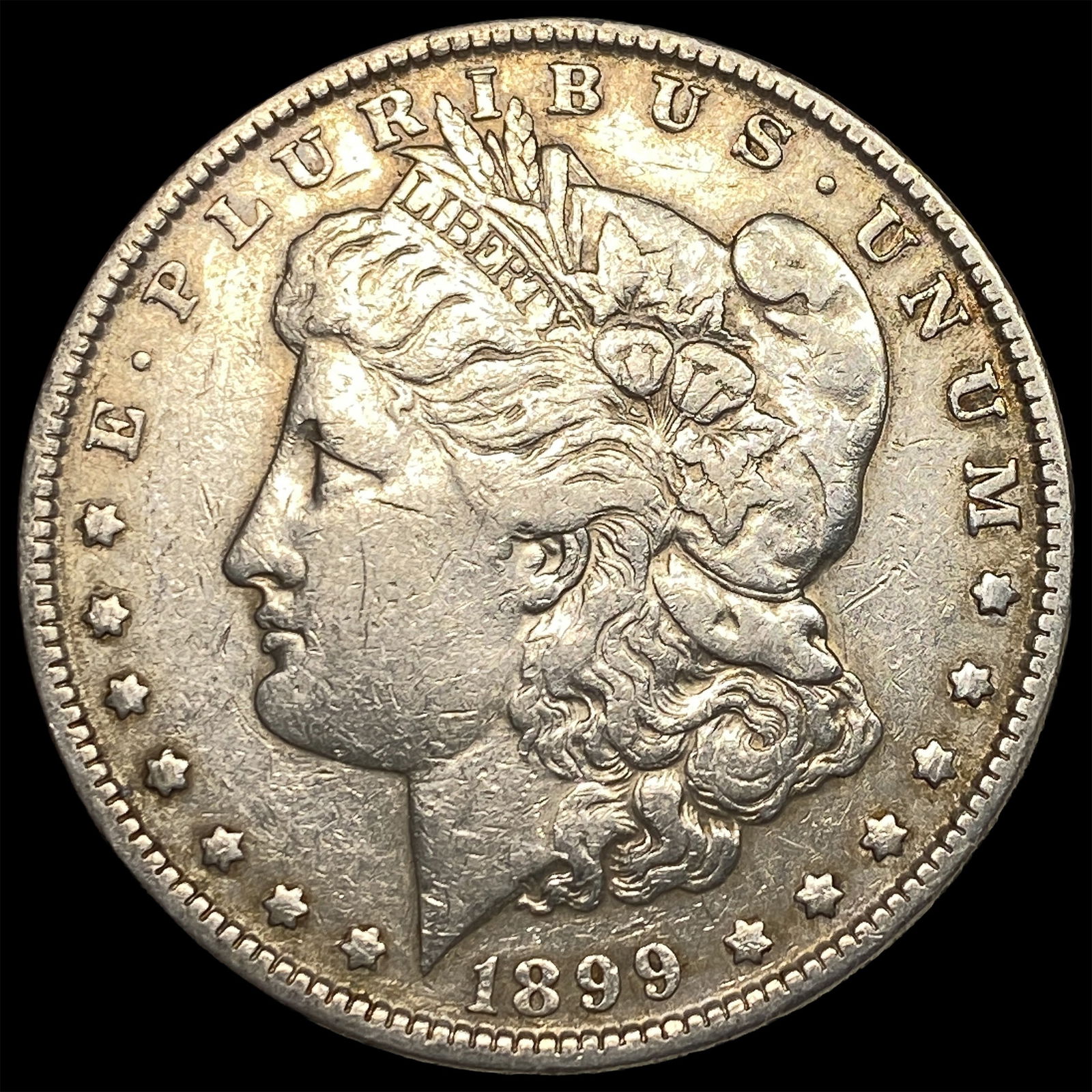 1899 Morgan Silver Dollar CLOSELY UNCIRCULATED (1 of 2)