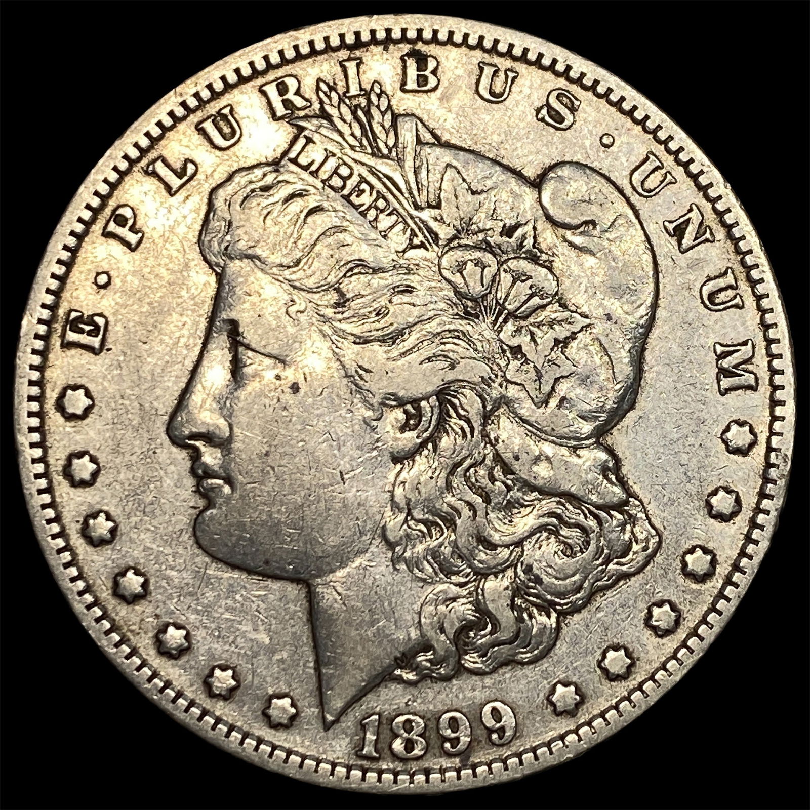 1899-O Silver Morgan Dollar NEARLY UNCIRCULATED: 1899-O Silver Morgan Dollar NEARLY UNCIRCULATED