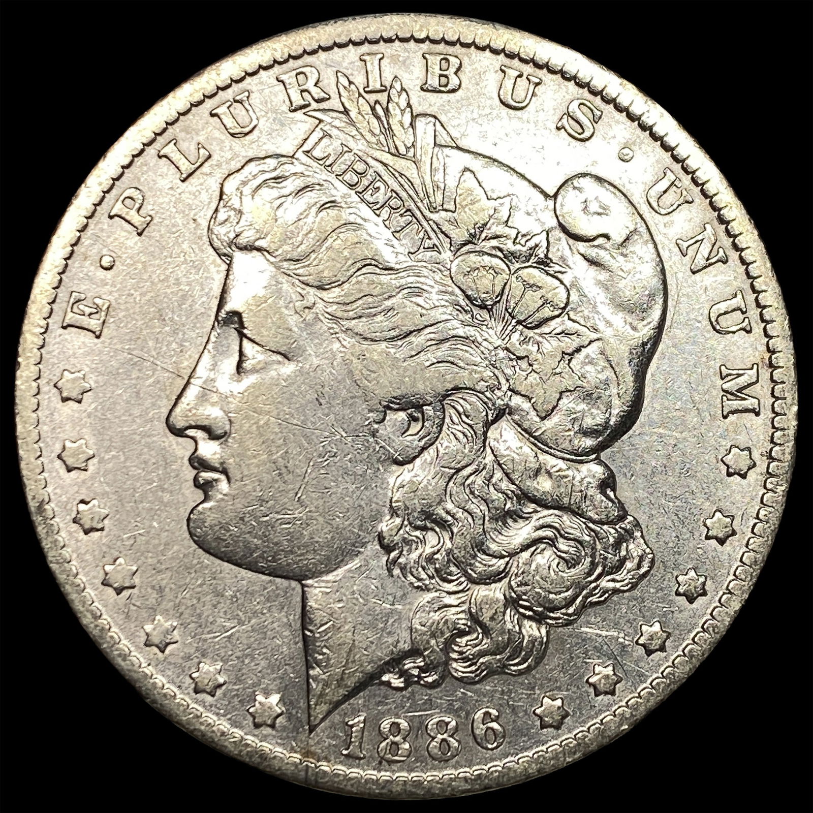 1886 Morgan Silver Dollar NEARLY UNCIRCULATED: 1886 Morgan Silver Dollar NEARLY UNCIRCULATED