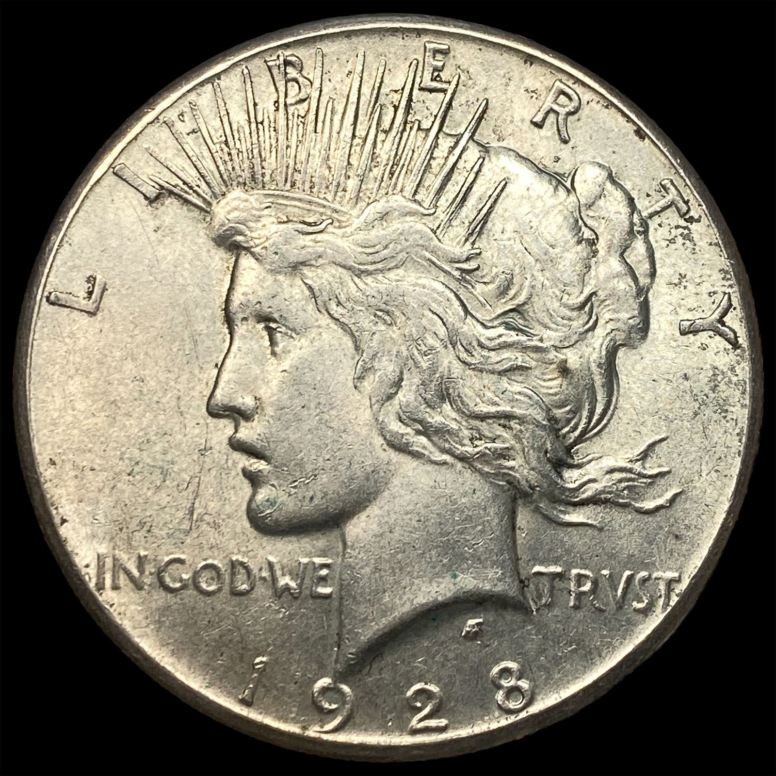 1928 Silver Peace Dollar CLOSELY UNCIRCULATED (1 of 2)