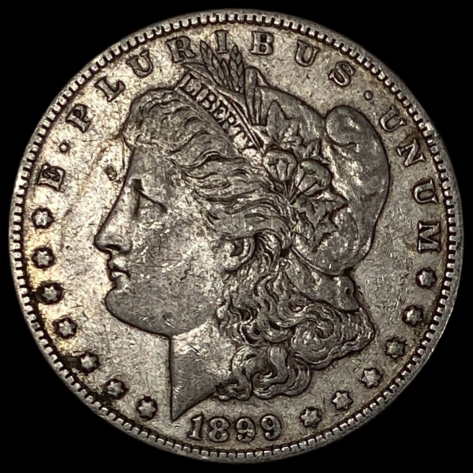 1899-O Micro O Silver Morgan Dollar NEARLY UNCIRCULATED: 1899-O Micro O Silver Morgan Dollar NEARLY UNCIRCULATED