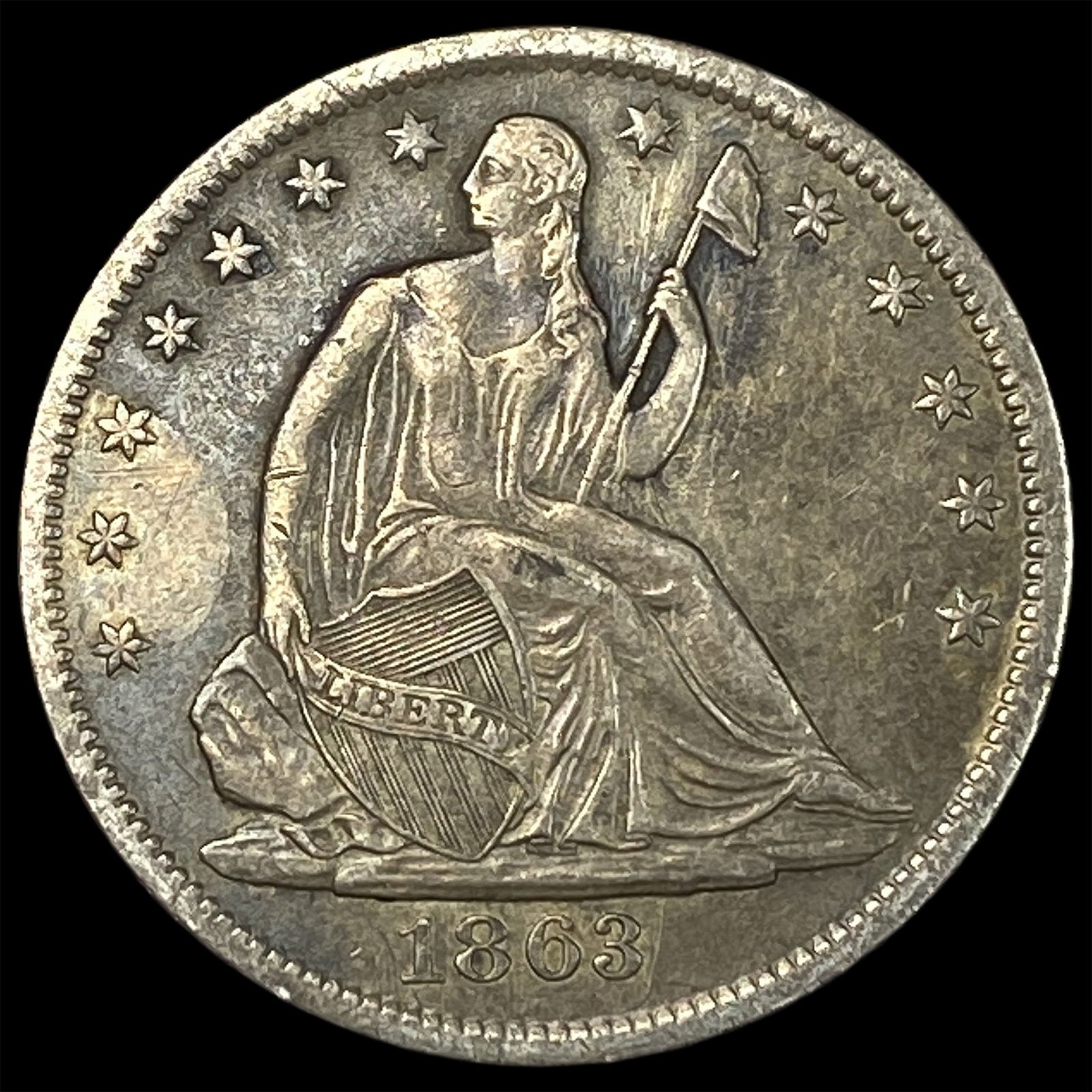 1863-S Silver Seated Liberty Half Dollar NEARLY UNCIRCULATED: 1863-S Silver Seated Liberty Half Dollar NEARLY UNCIRCULATED