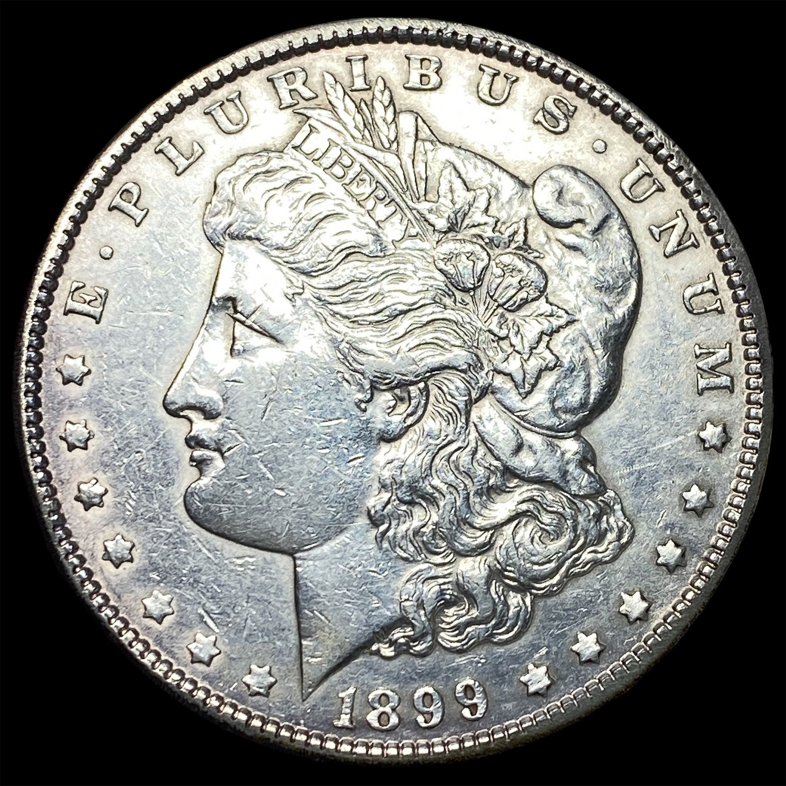 1899-O Silver Morgan Dollar CLOSELY UNCIRCULATED: 1899-O Silver Morgan Dollar CLOSELY UNCIRCULATED