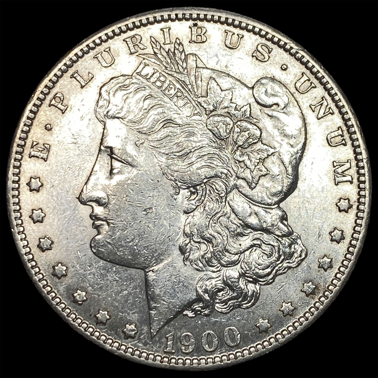 1900 Morgan Silver Dollar CLOSELY UNCIRCULATED (1 of 2)