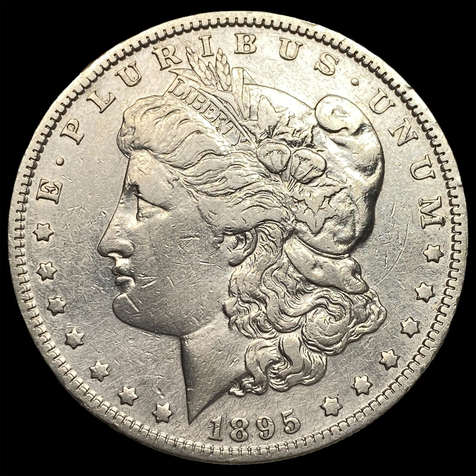 1895-O Silver Morgan Dollar CLOSELY UNCIRCULATED: 1895-O Silver Morgan Dollar CLOSELY UNCIRCULATED