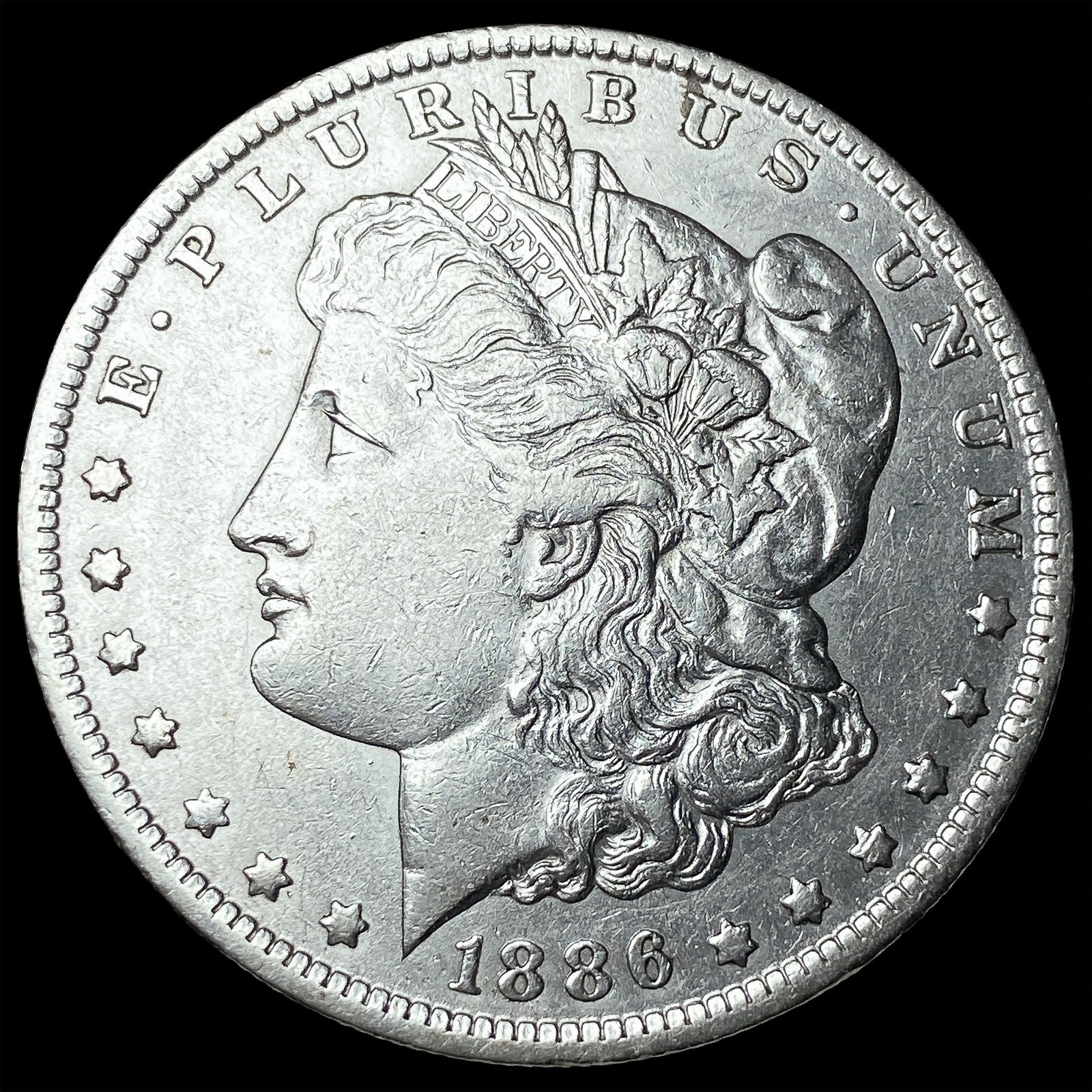 1886-O Silver Morgan Dollar CLOSELY UNCIRCULATED: 1886-O Silver Morgan Dollar CLOSELY UNCIRCULATED