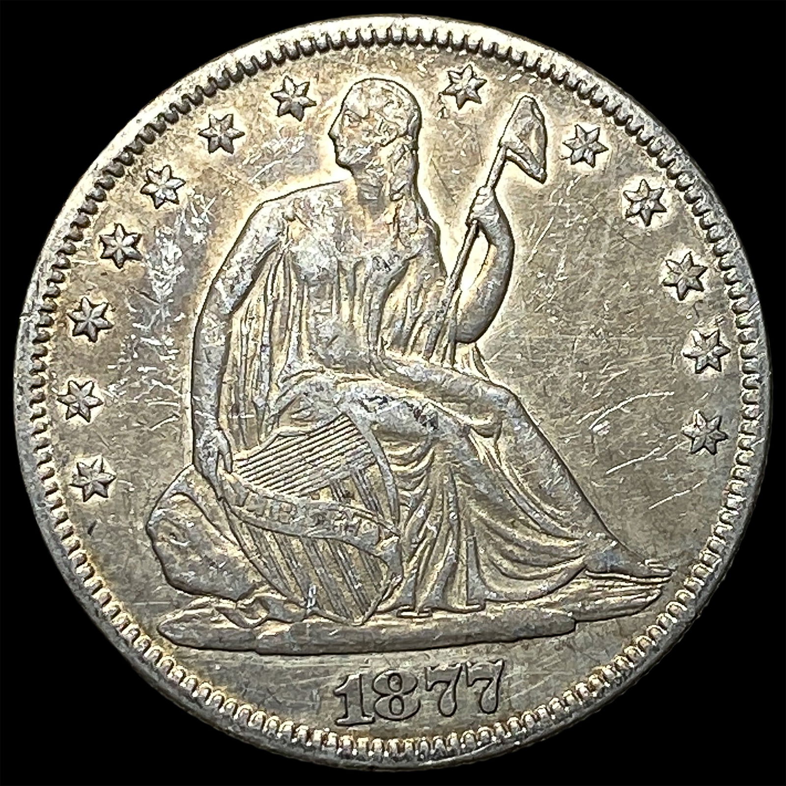 1877 Seated Liberty Half Dollar NEARLY UNCIRCULATED: 1877 Seated Liberty Half Dollar NEARLY UNCIRCULATED