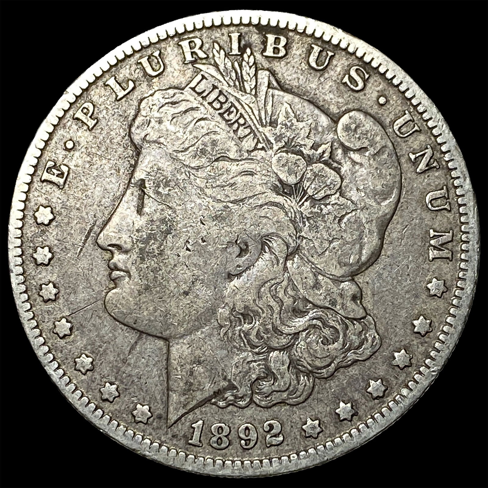 1892-O Silver Morgan Dollar ABOUT UNCIRCULATED: 1892-O Silver Morgan Dollar ABOUT UNCIRCULATED