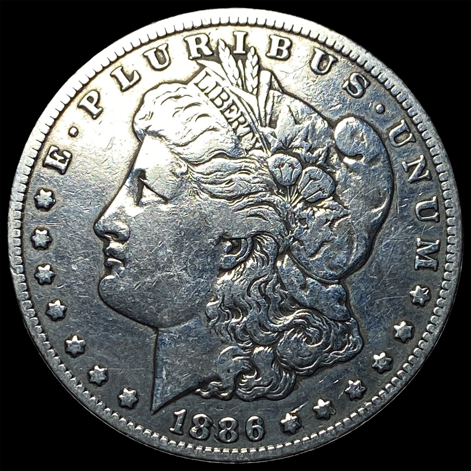 1886-O Silver Morgan Dollar ABOUT UNCIRCULATED: 1886-O Silver Morgan Dollar ABOUT UNCIRCULATED