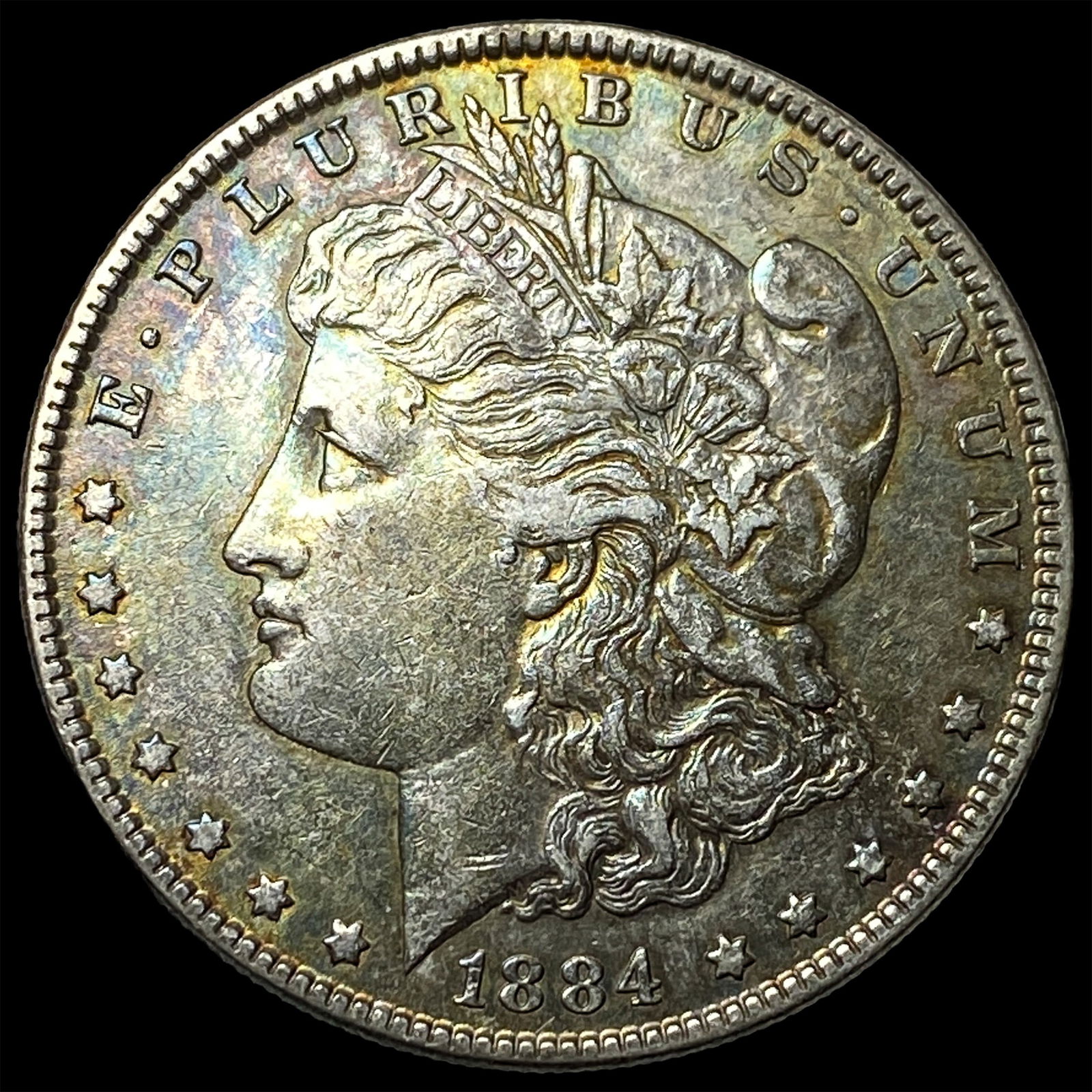 1884 Morgan Silver Dollar CLOSELY UNCIRCULATED (1 of 2)