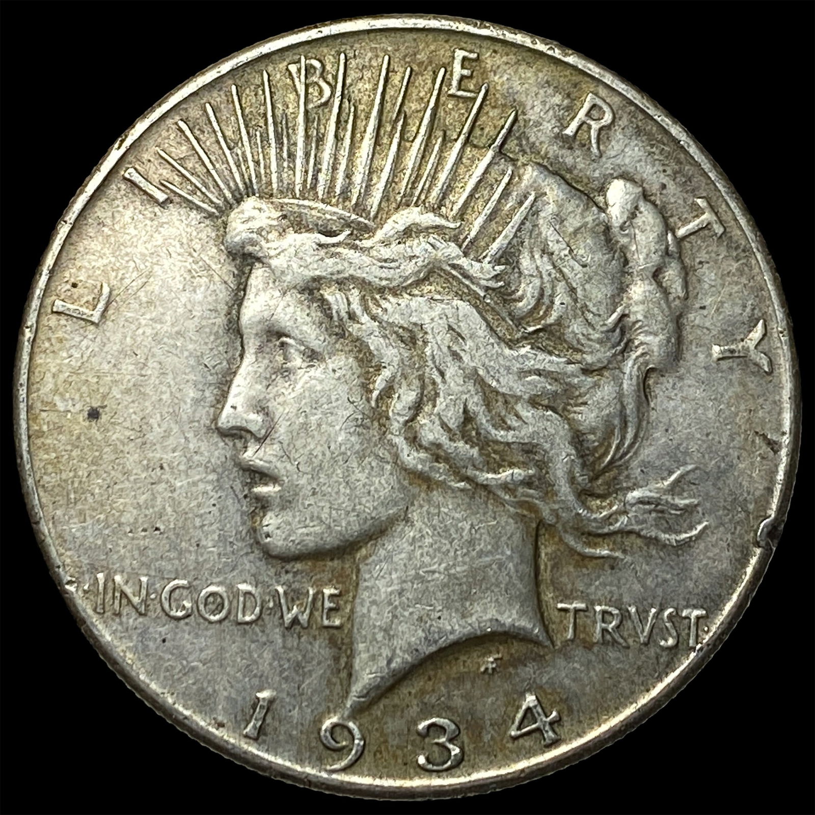 1934 Peace Silver Dollar NEARLY UNCIRCULATED (1 of 2)