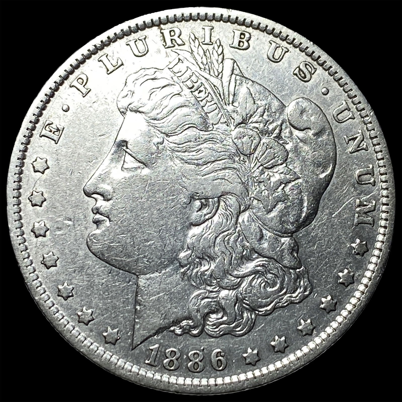 1886-O Silver Morgan Dollar CLOSELY UNCIRCULATED: 1886-O Silver Morgan Dollar CLOSELY UNCIRCULATED
