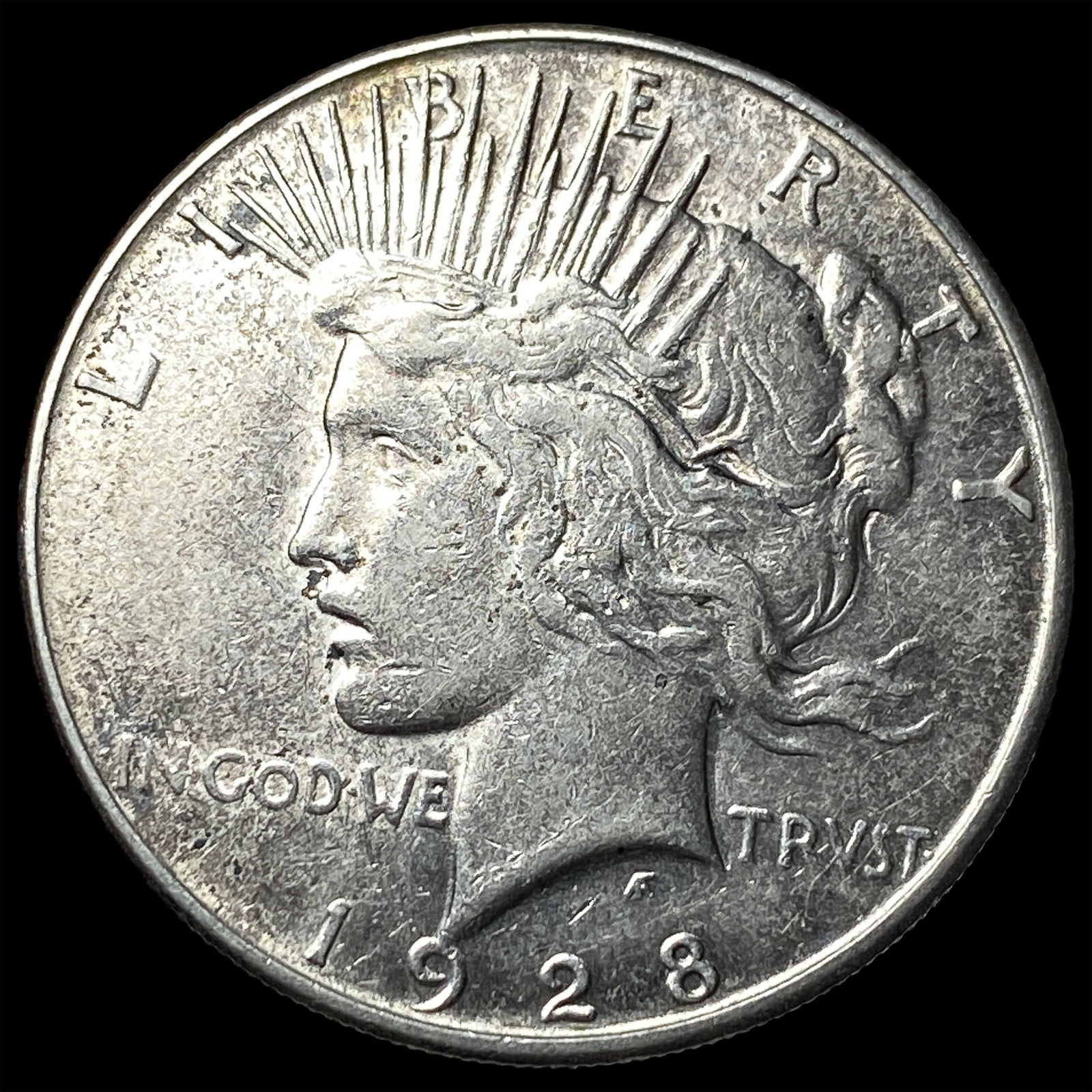 1928 Silver Peace Dollar CLOSELY UNCIRCULATED (1 of 2)