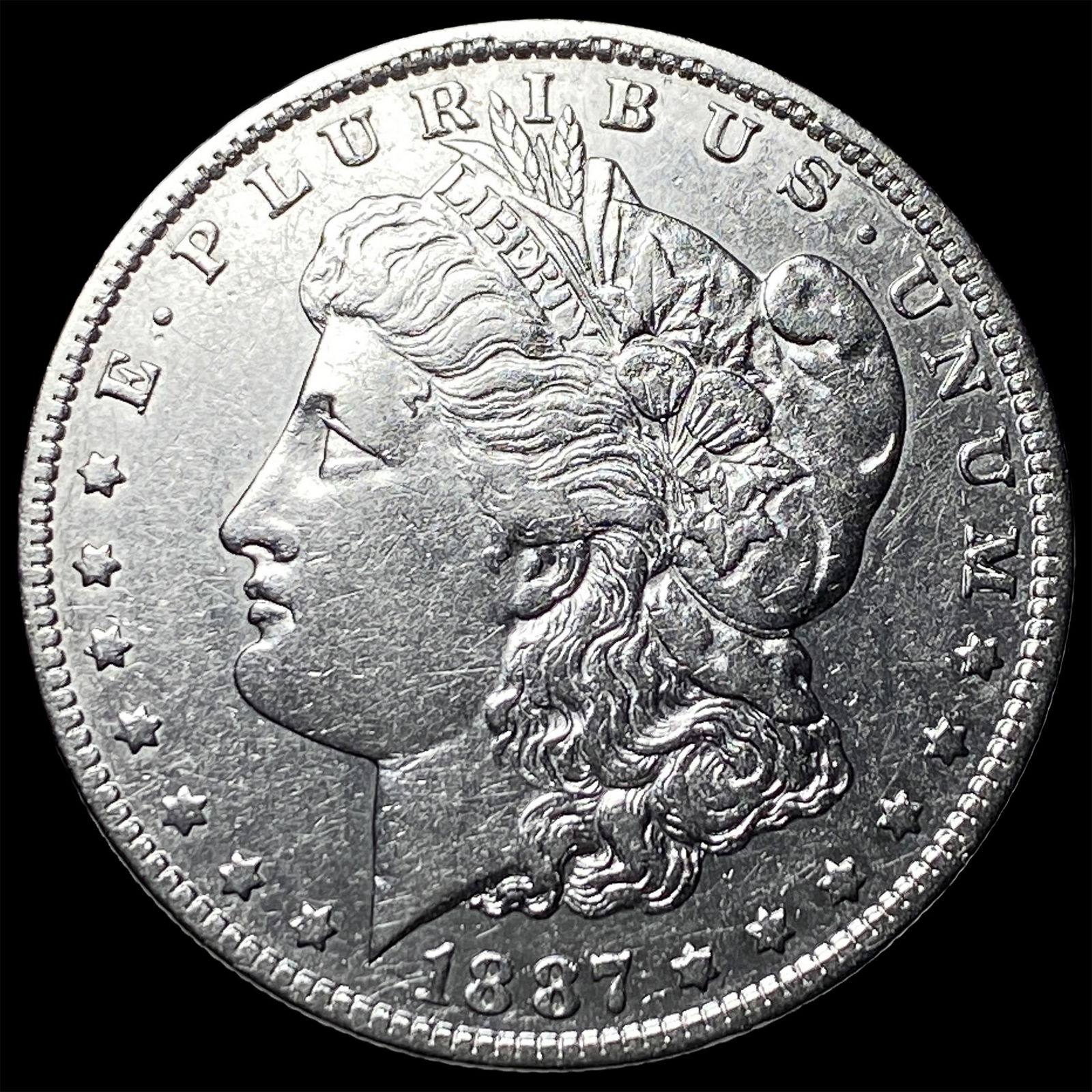 1887-O Silver Morgan Dollar NEARLY UNCIRCULATED: 1887-O Silver Morgan Dollar NEARLY UNCIRCULATED