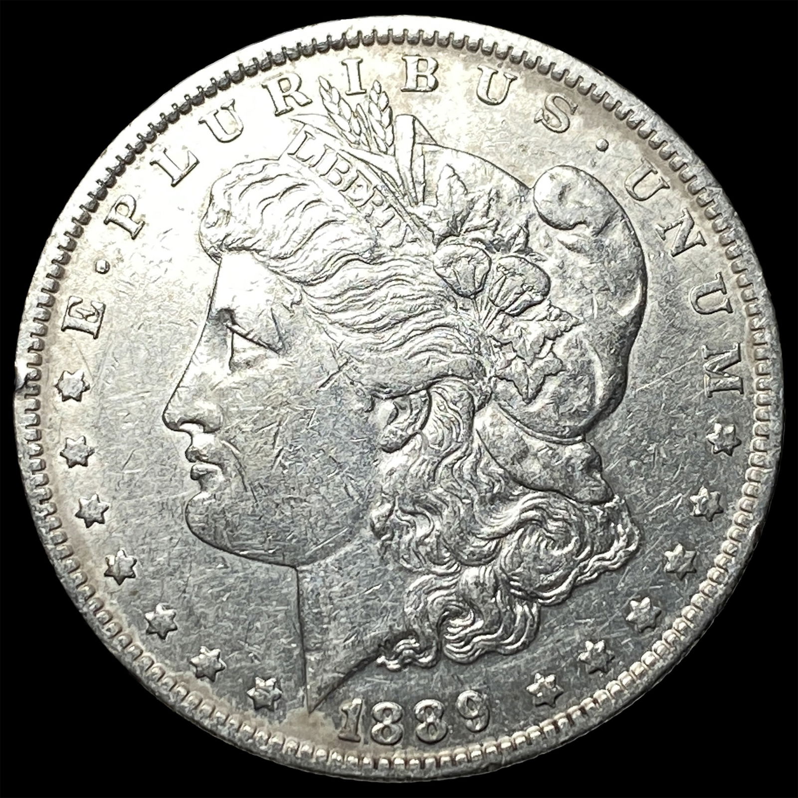 1889-O Silver Morgan Dollar CLOSELY UNCIRCULATED (1 of 2)
