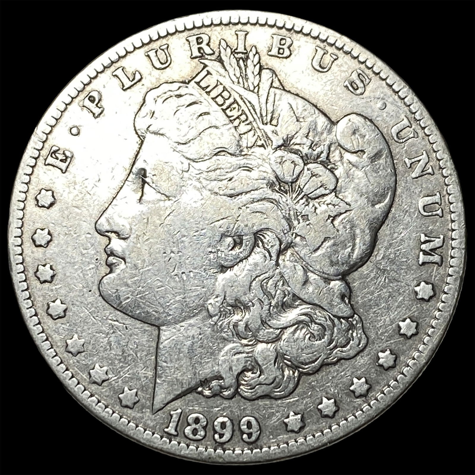 1899-O Silver Morgan Dollar NEARLY UNCIRCULATED (1 of 2)